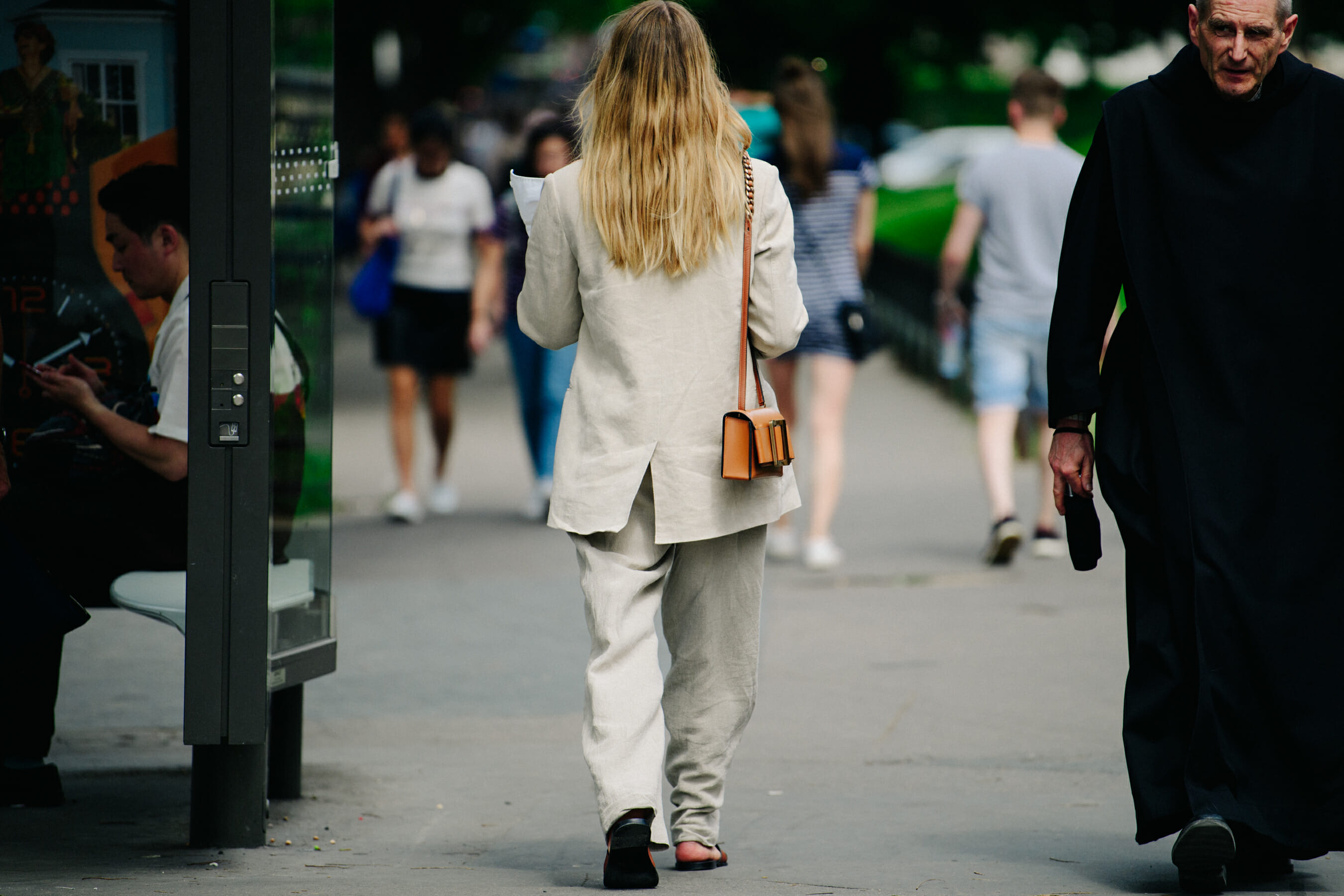 Woman wearing pale linen suit
