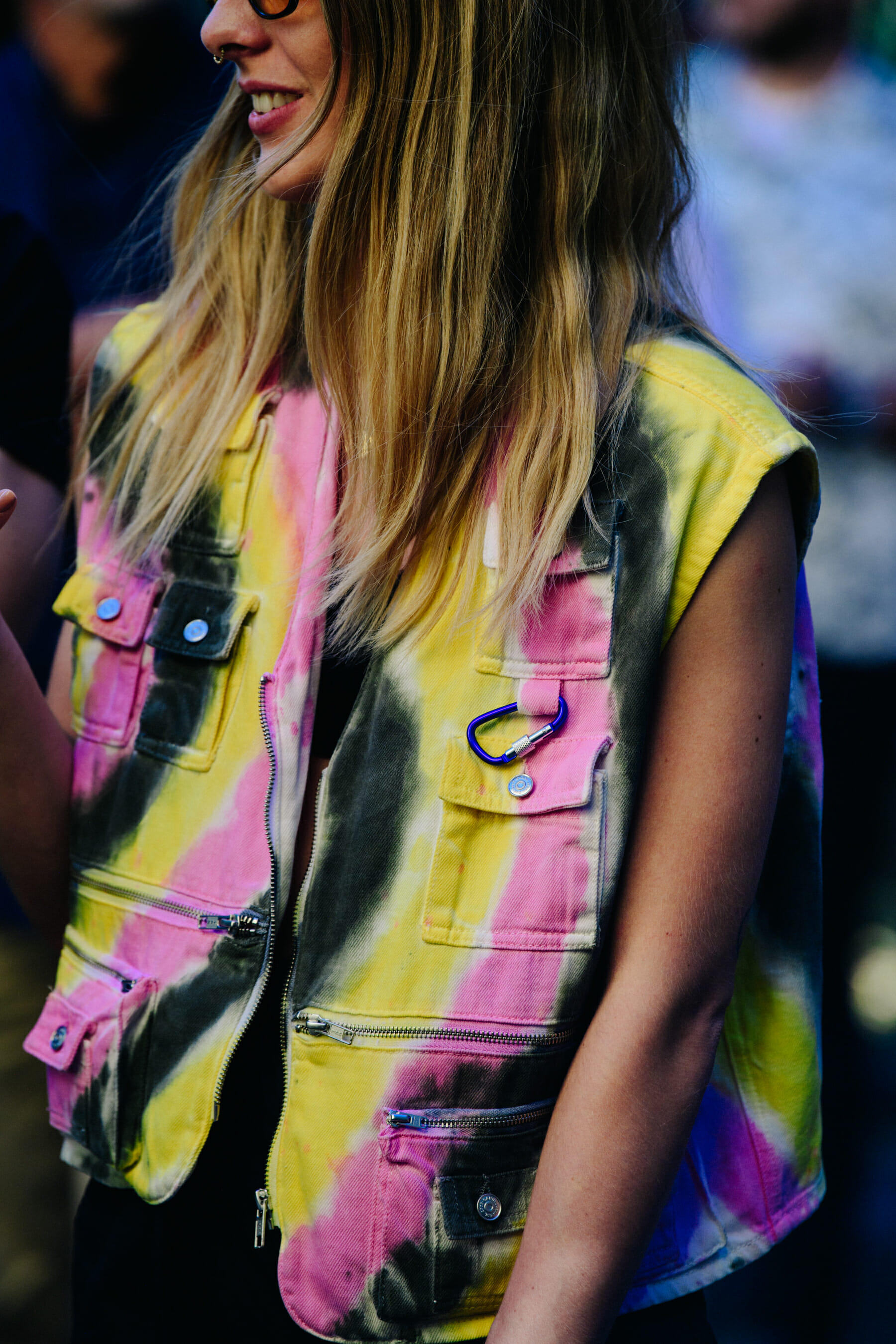 Woman wearing colourful vest