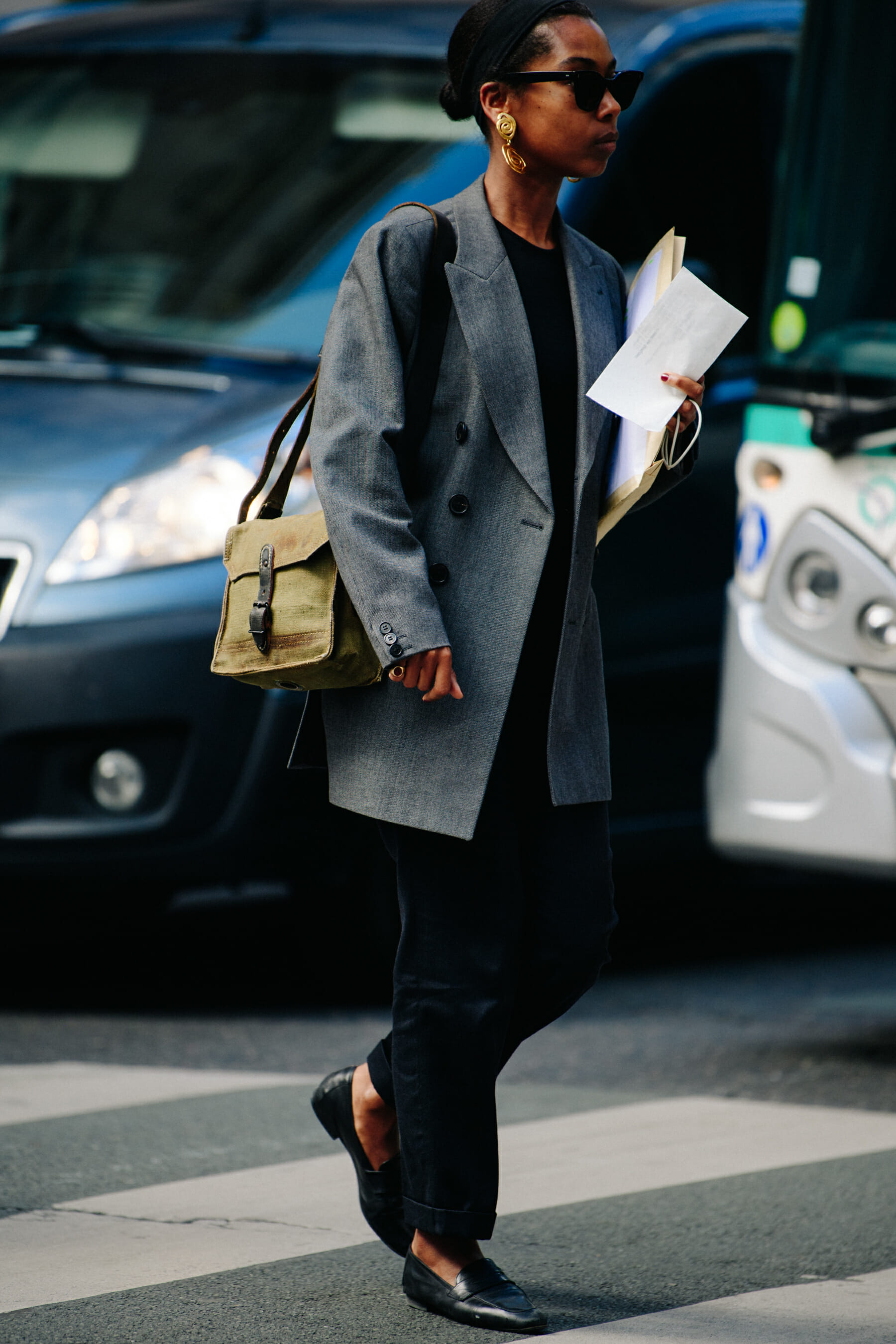 Woman wearing grey jacket