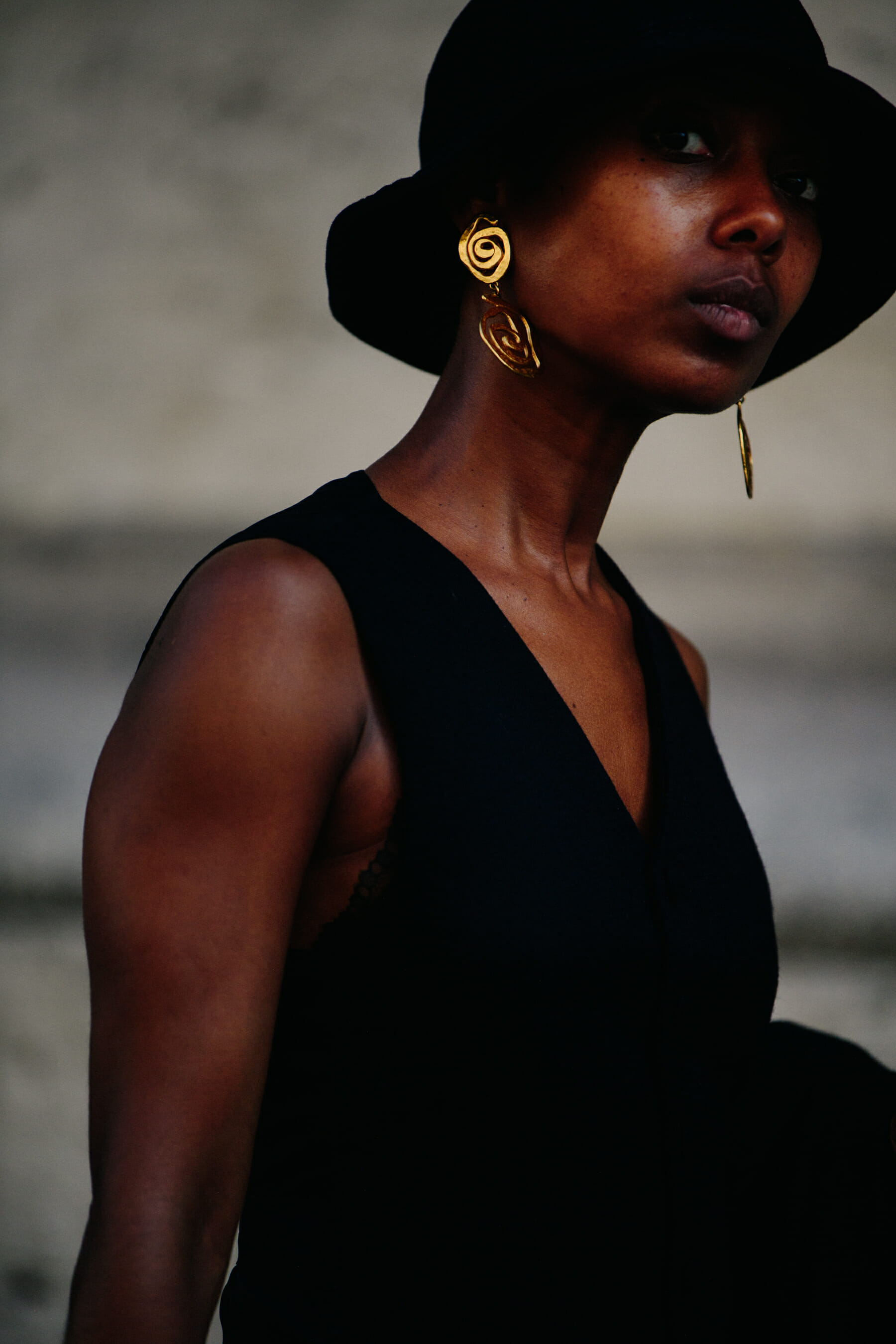 Woman wearing gold earrings