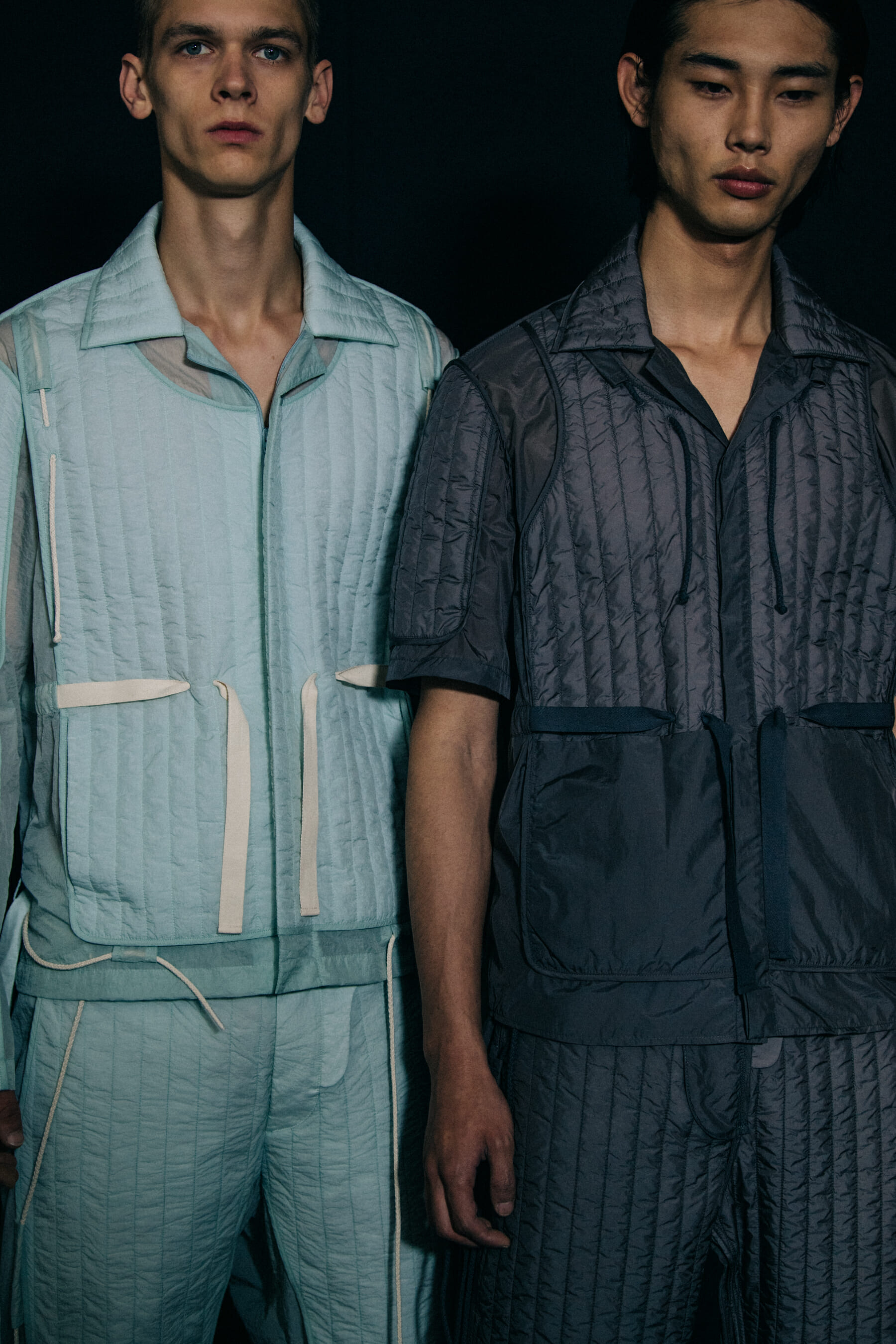 Models wearing dark Craig Green outfits