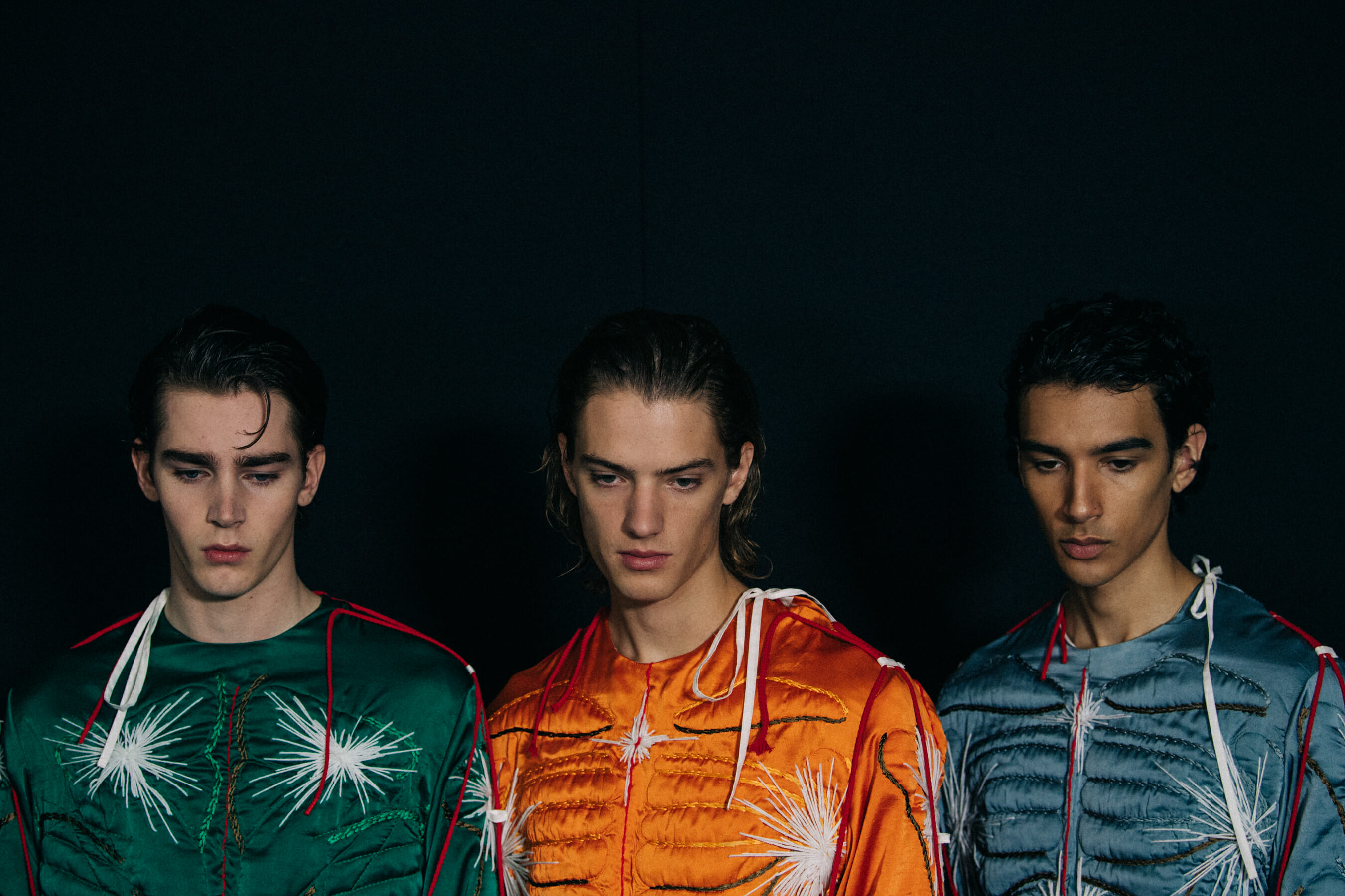 Models wearing colourful Craig Green outfits