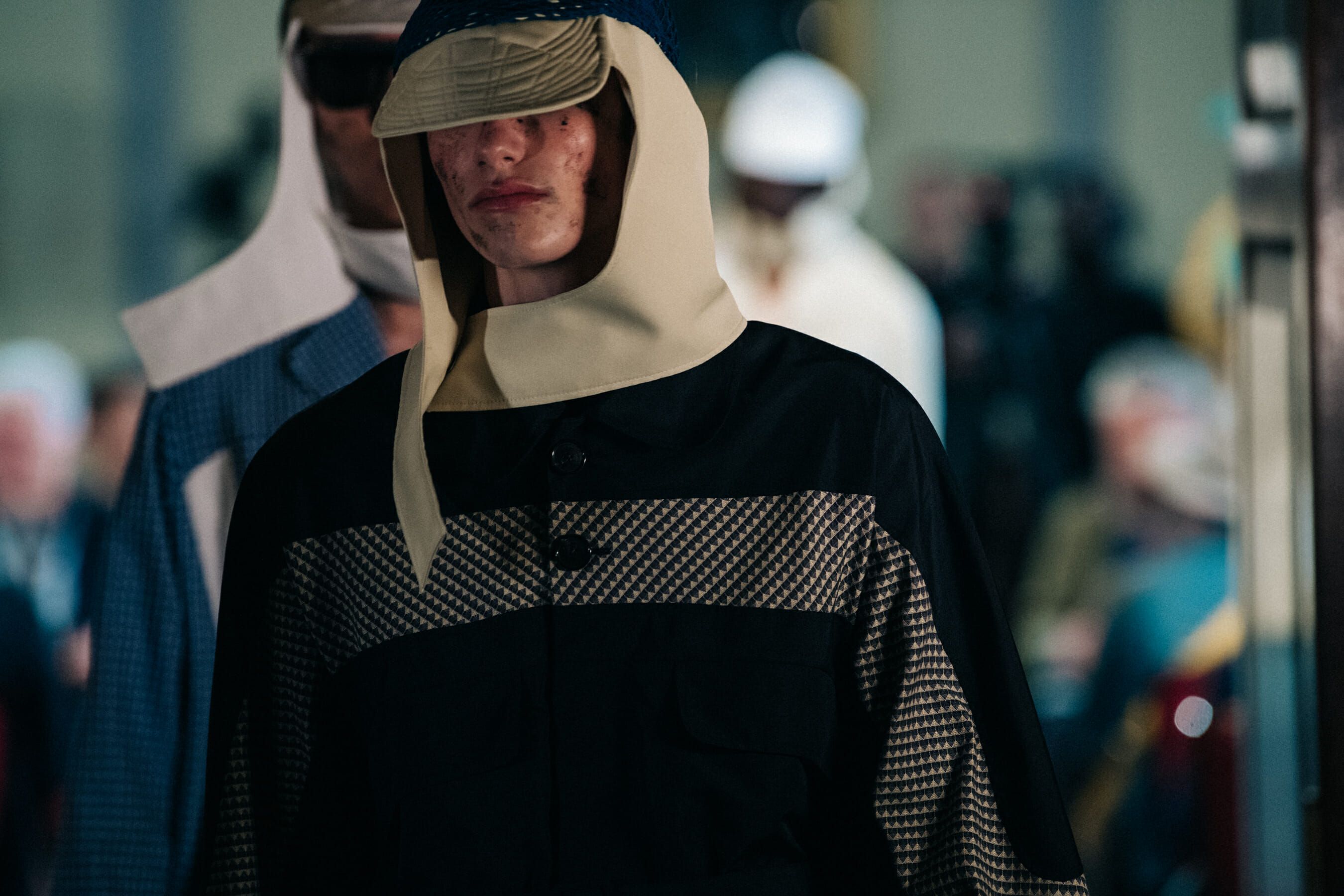 Models wearing colourful caps at Kiko Kostadinov