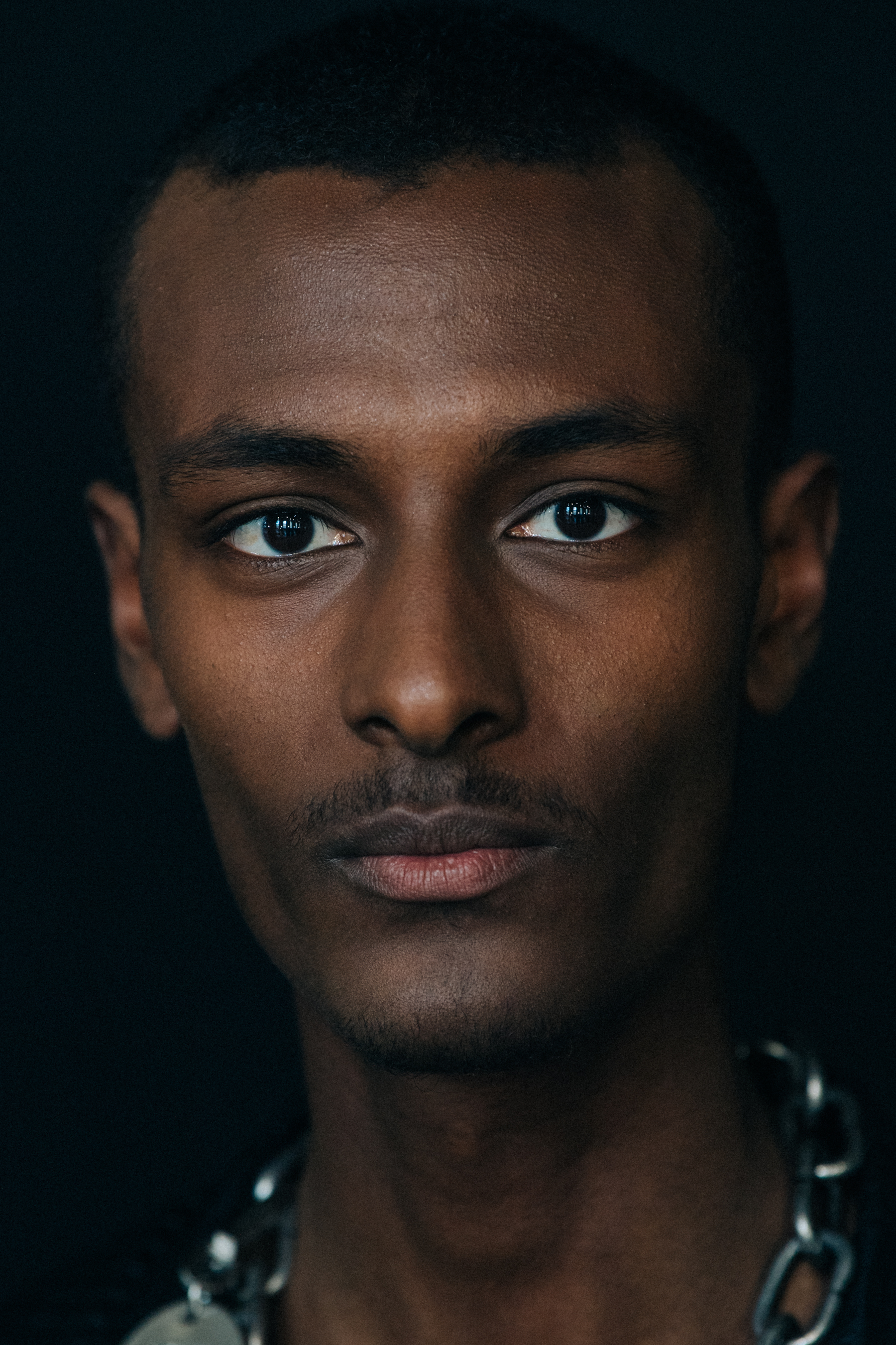 Portrait of model with shaved hair