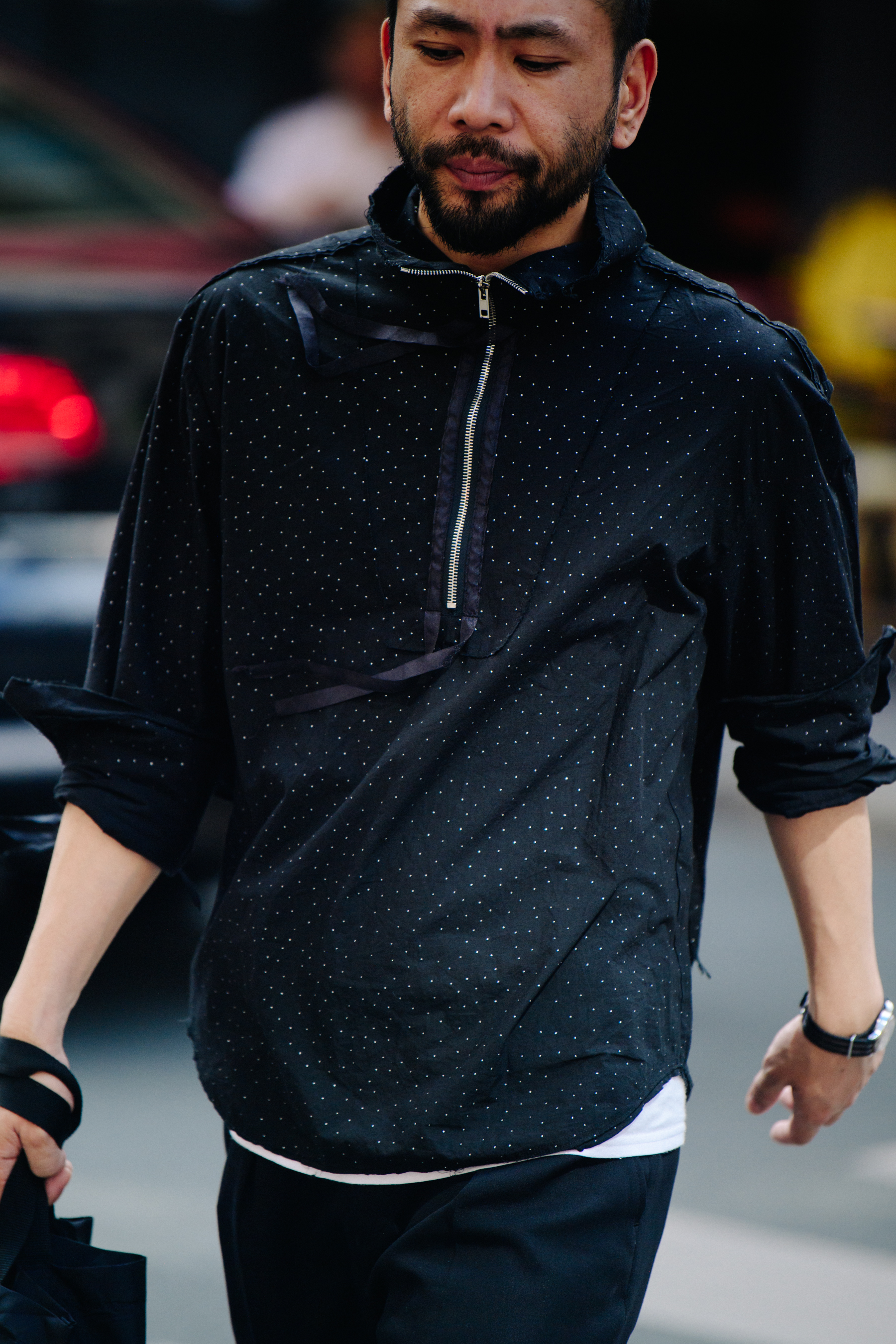 Man wearing black sports top