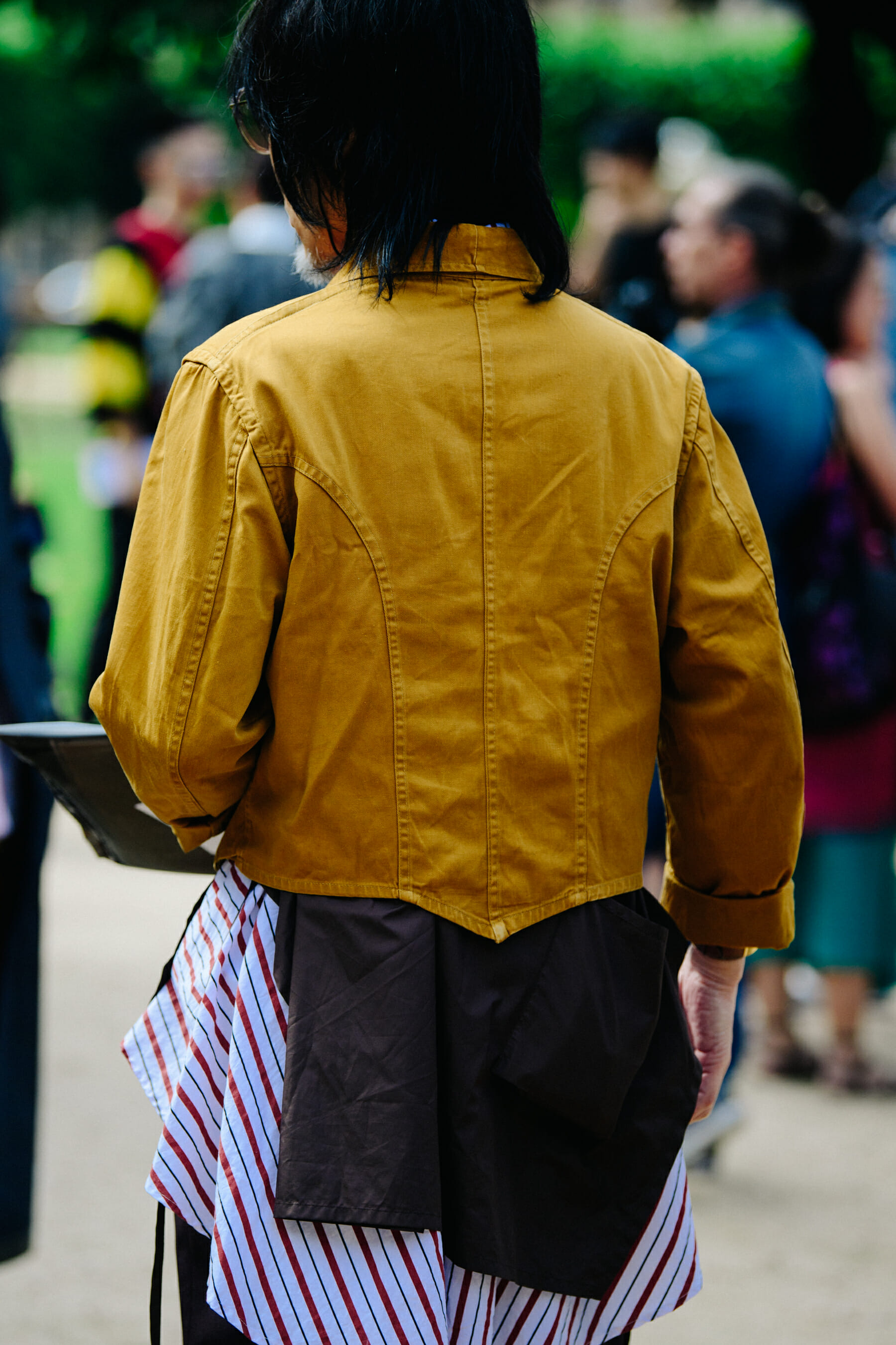 Man wearing yellow jacket