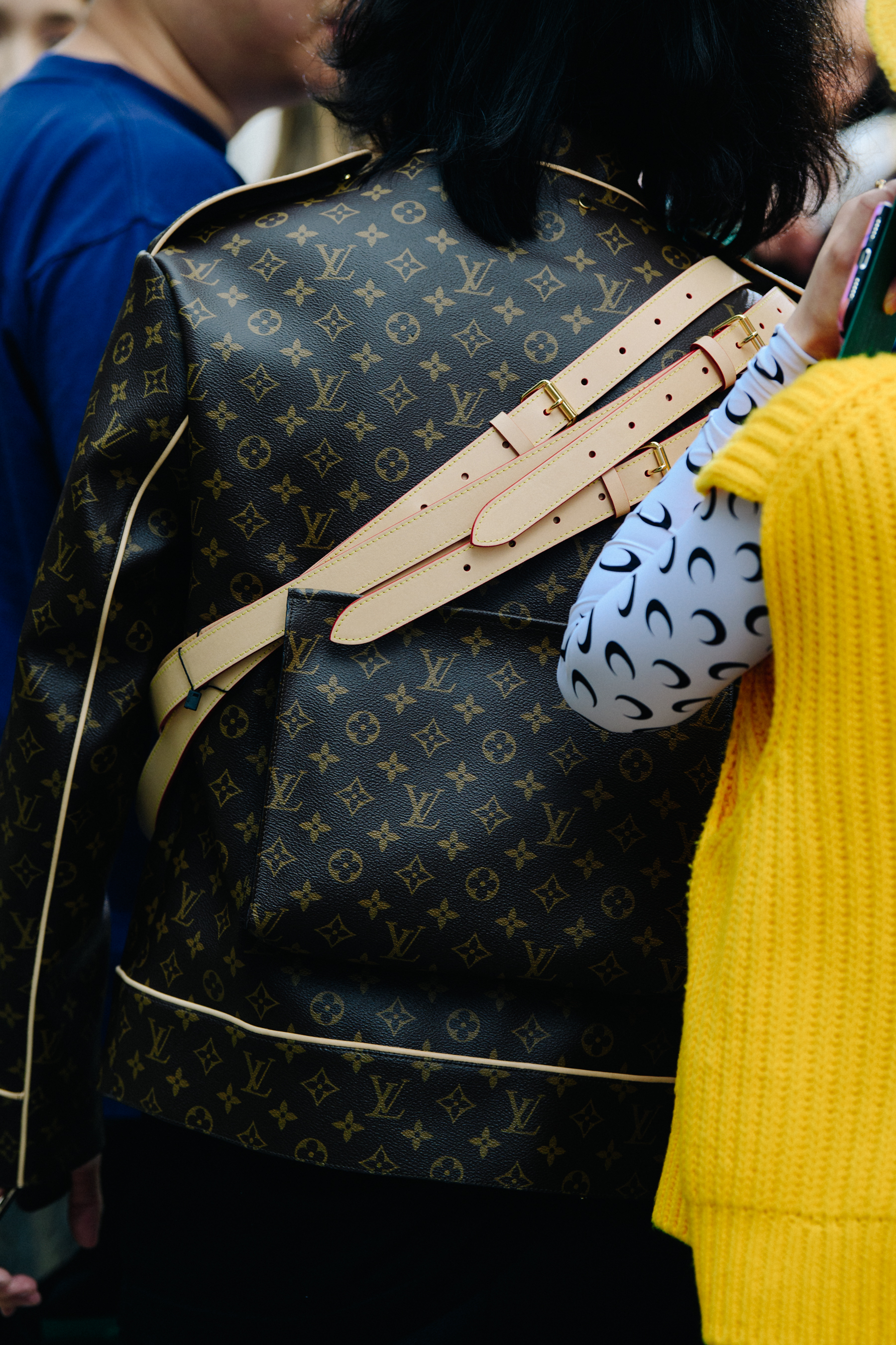 Man wearing Louis Vuitton jacket