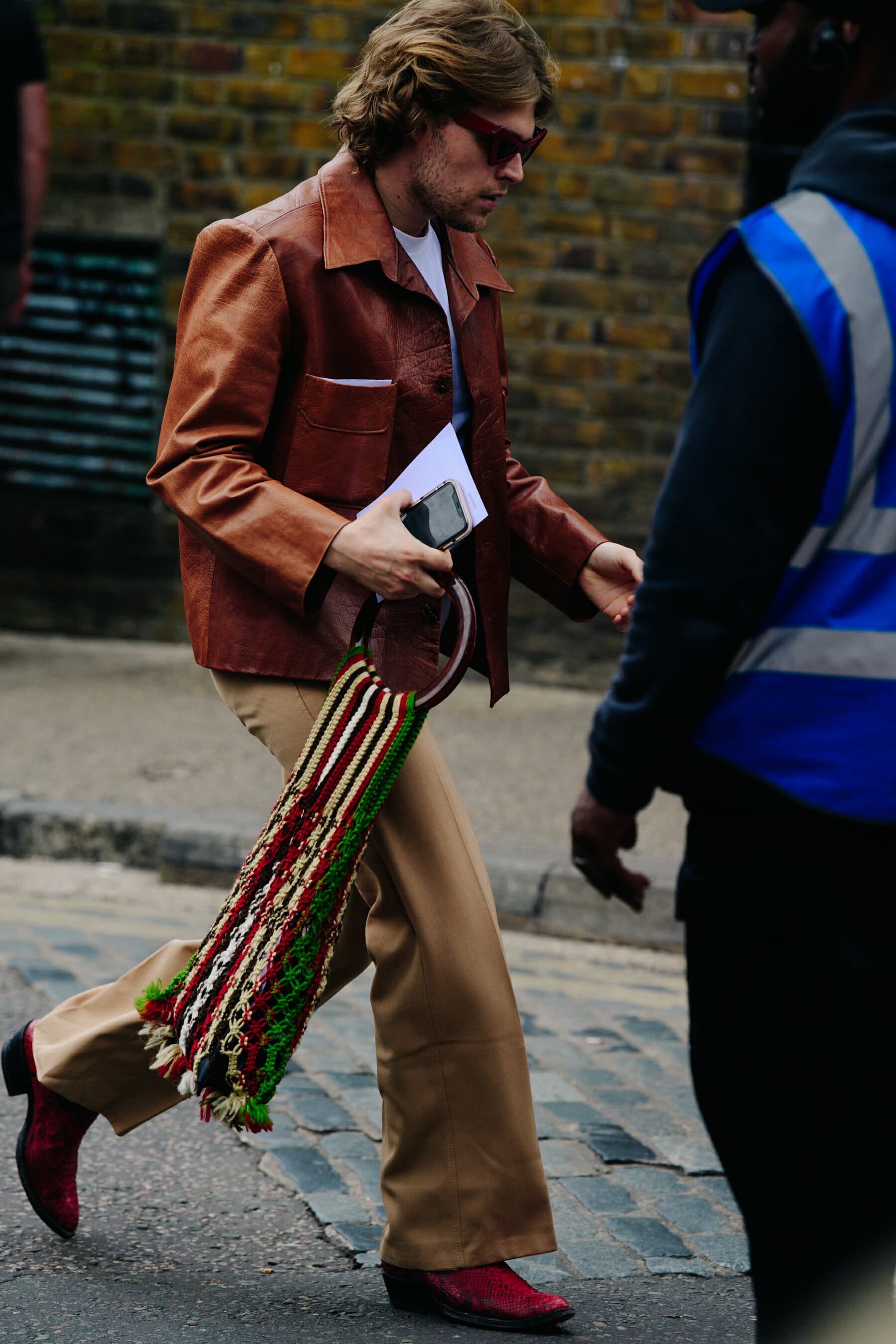 Man wearing brown outfit