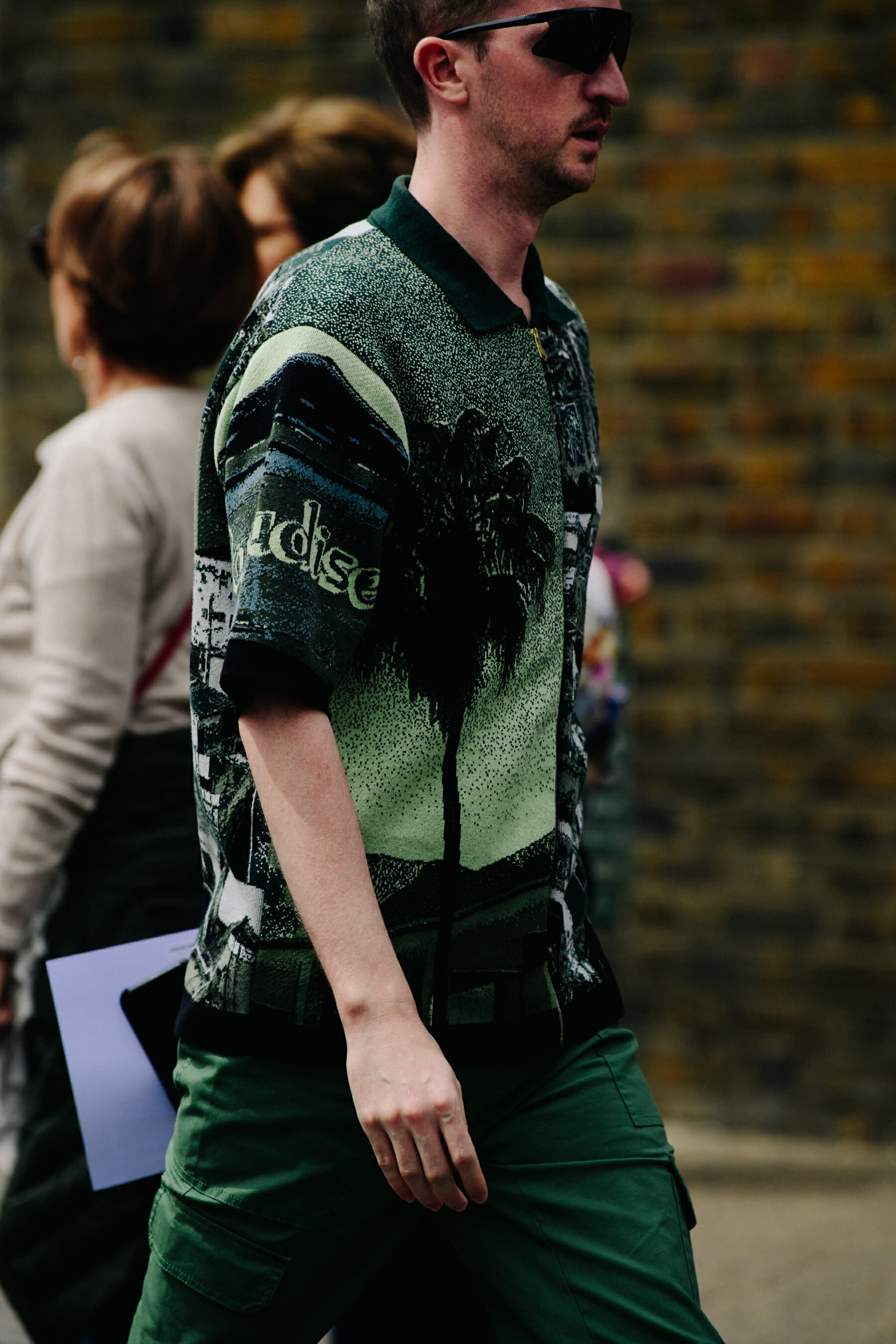 Man wearing green pattern shirt