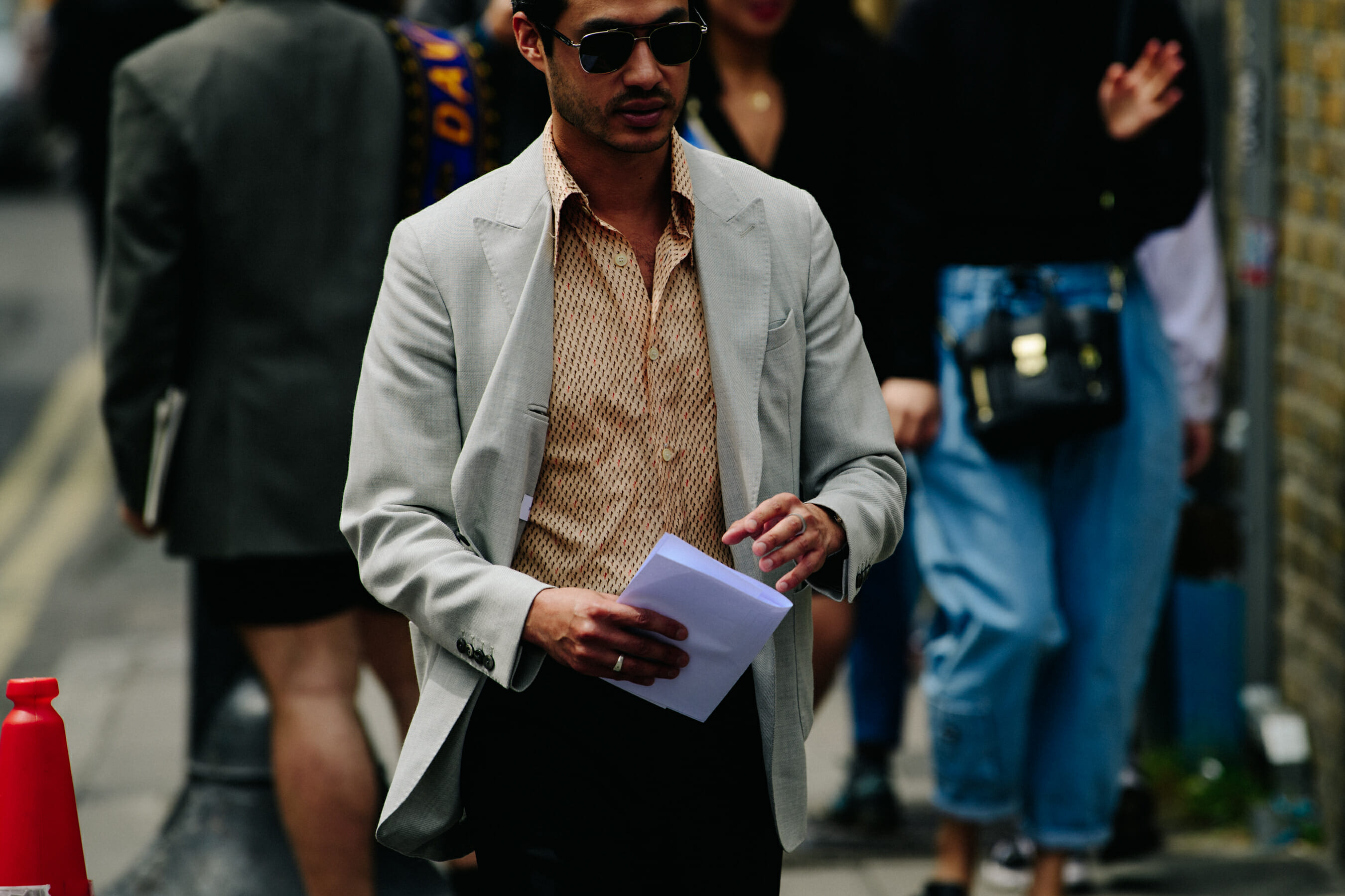Man wearing pale jacket