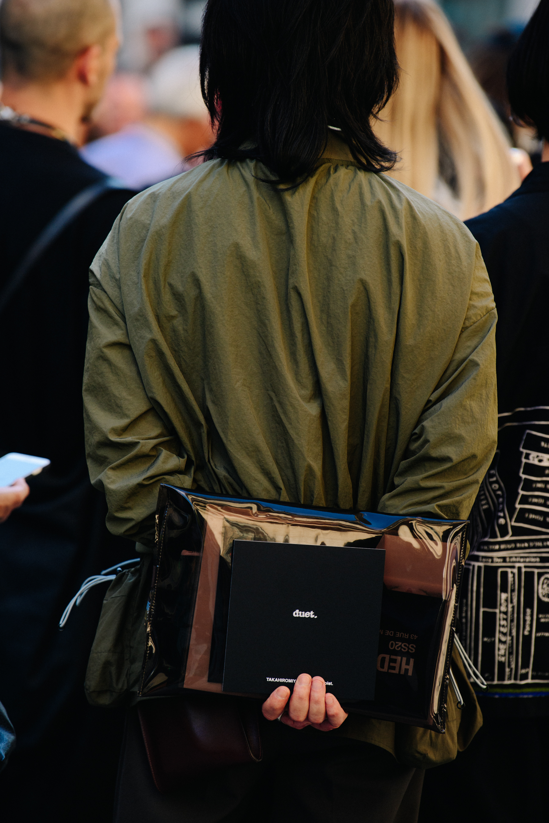 Man wearing green jacket