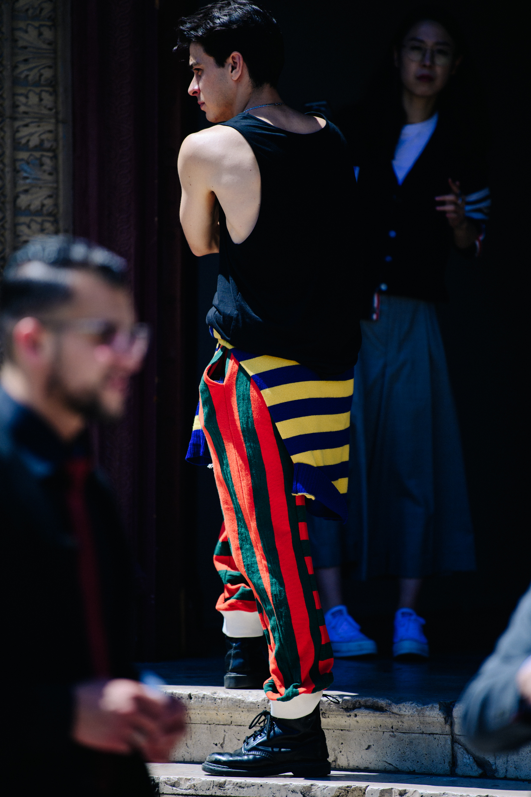 Man wearing striped outfit