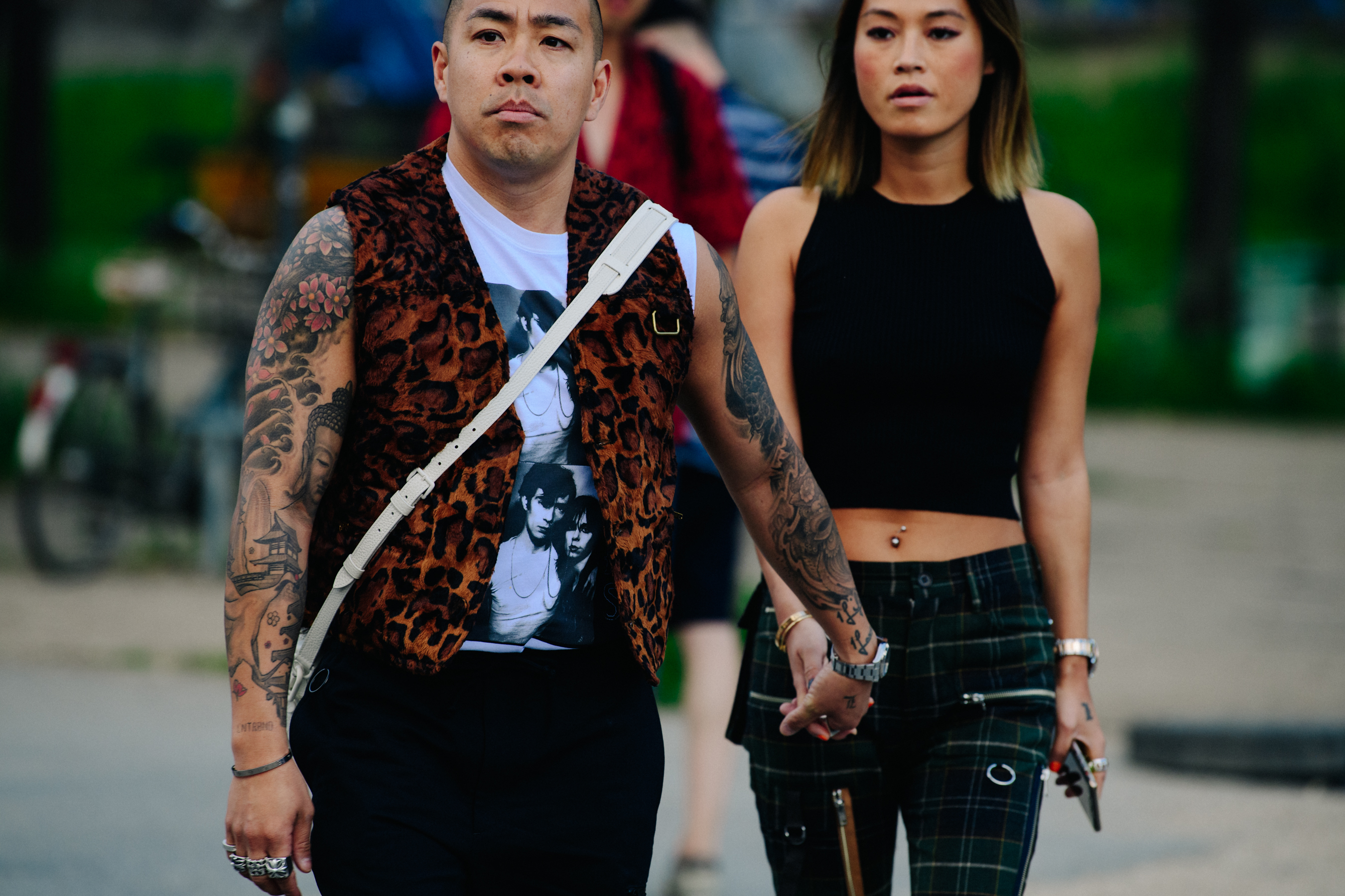 Couple wearing vests