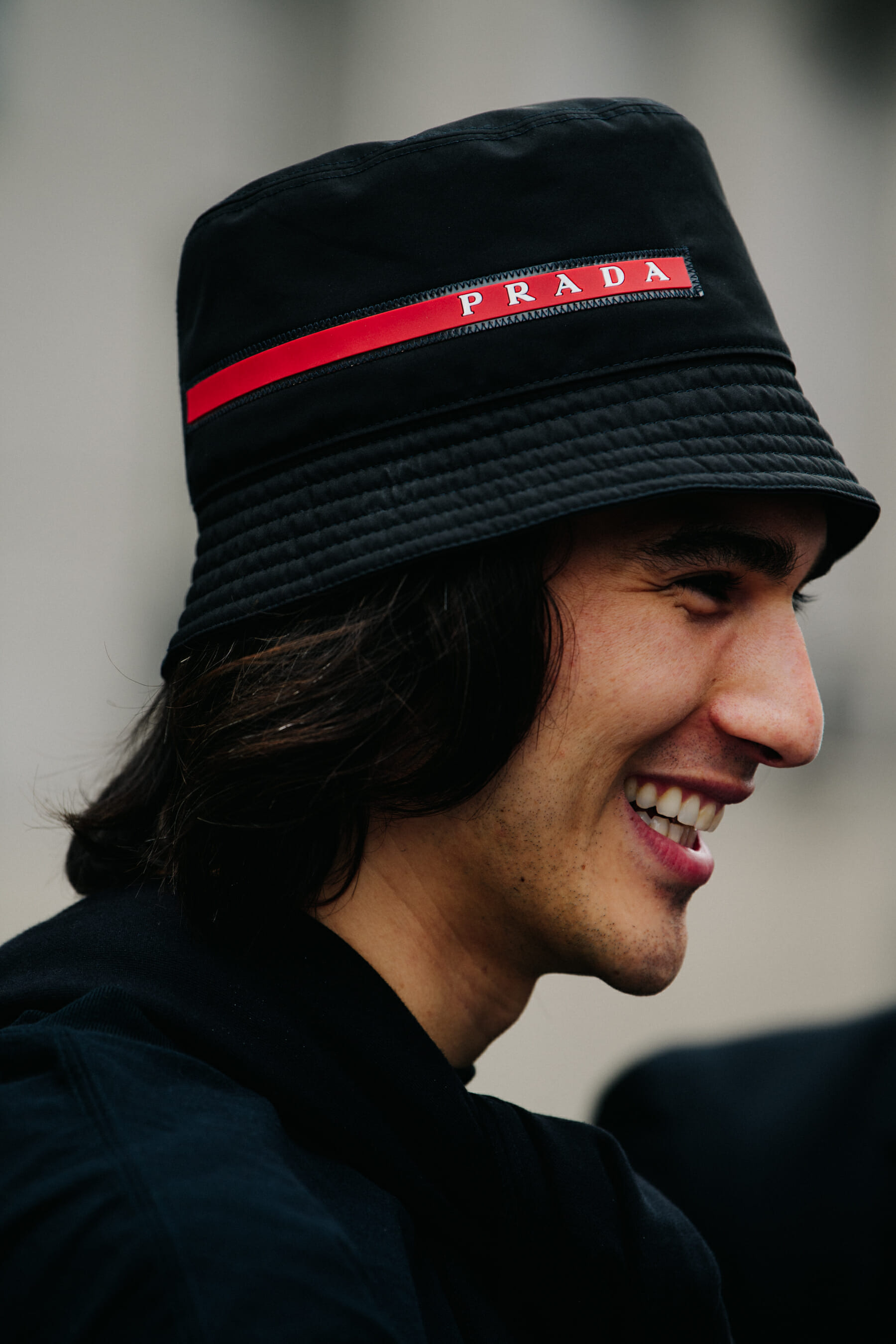 Man wearing Prada hat