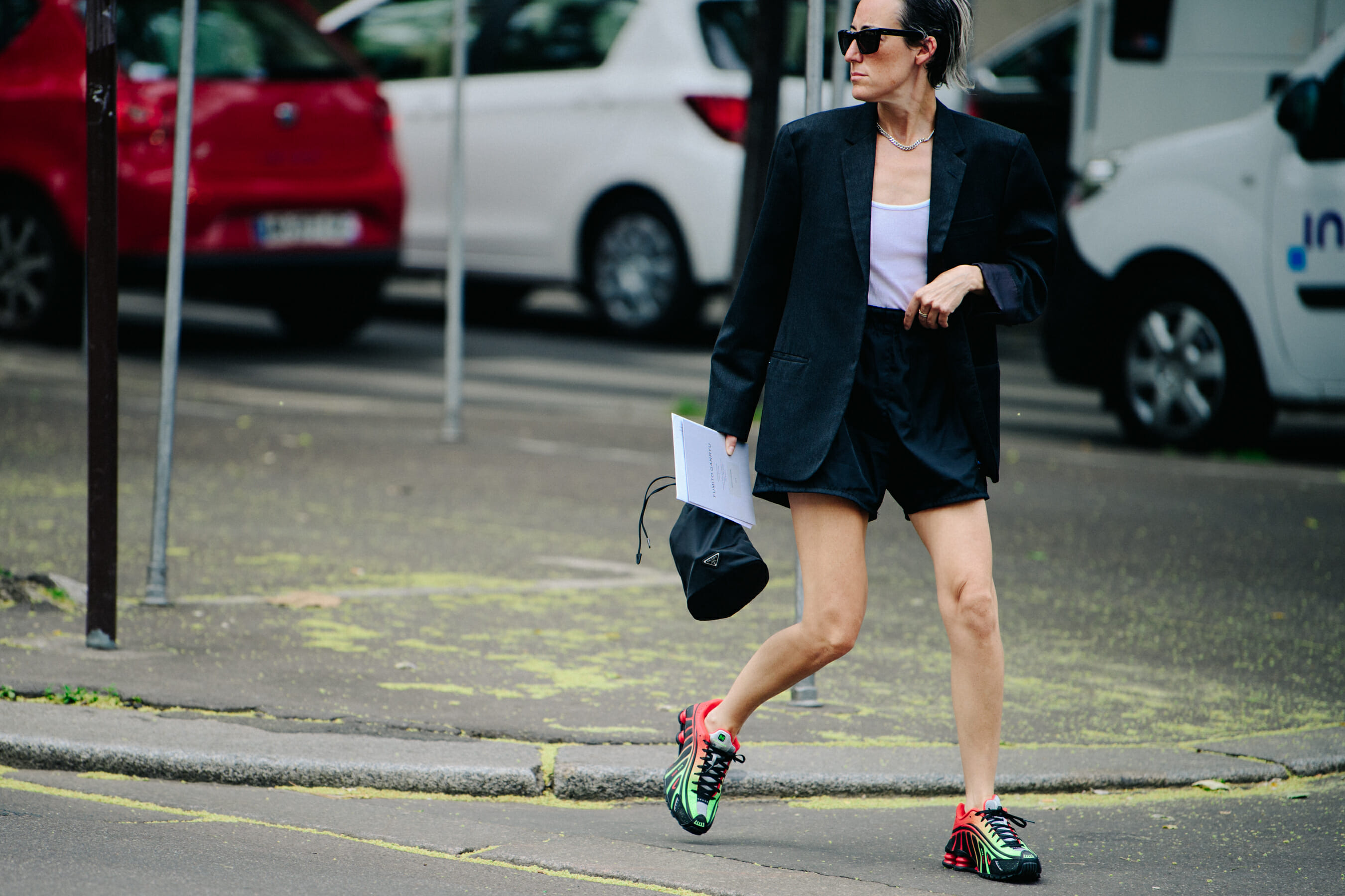 Woman carrying Prada bag