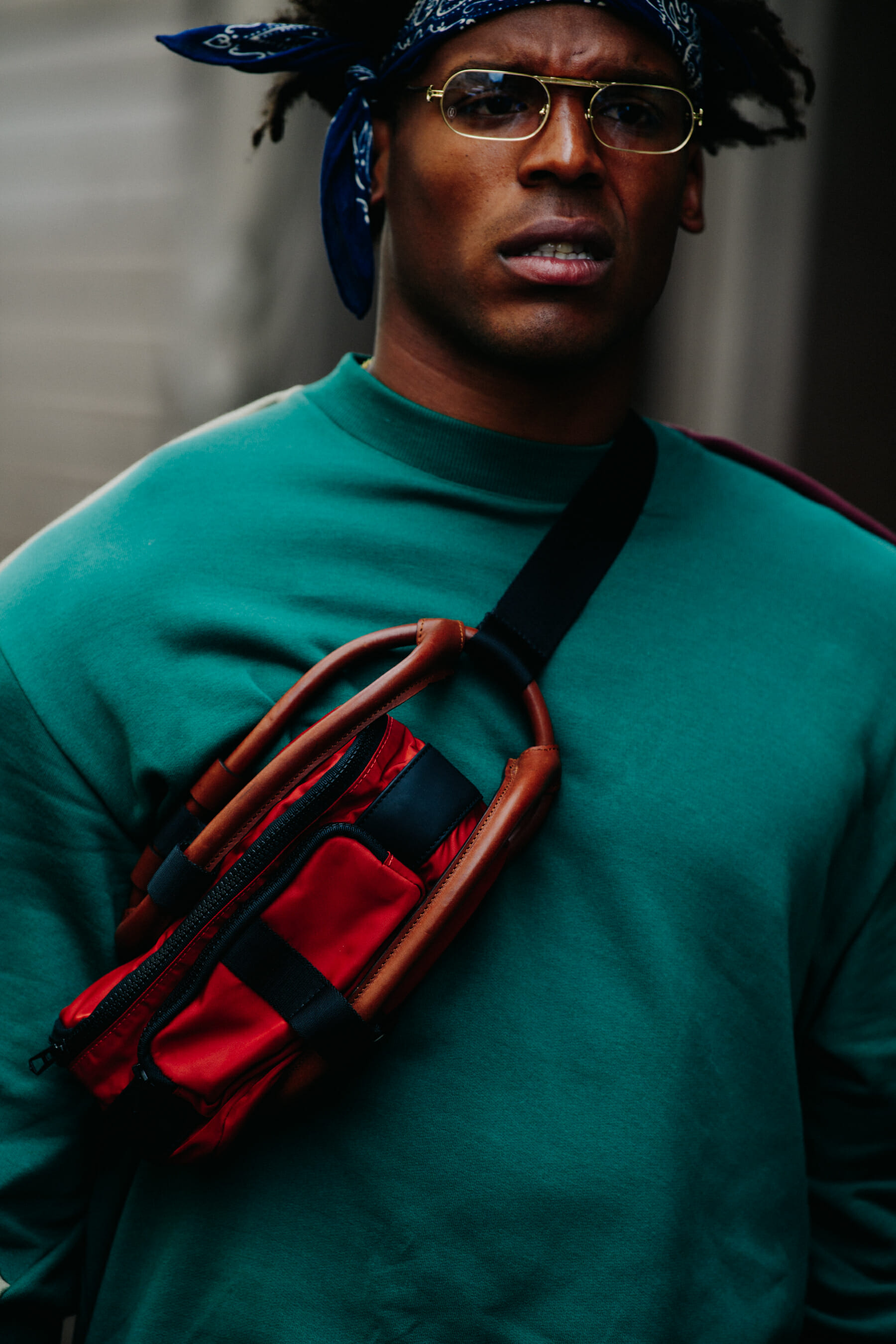 Man carrying small bag
