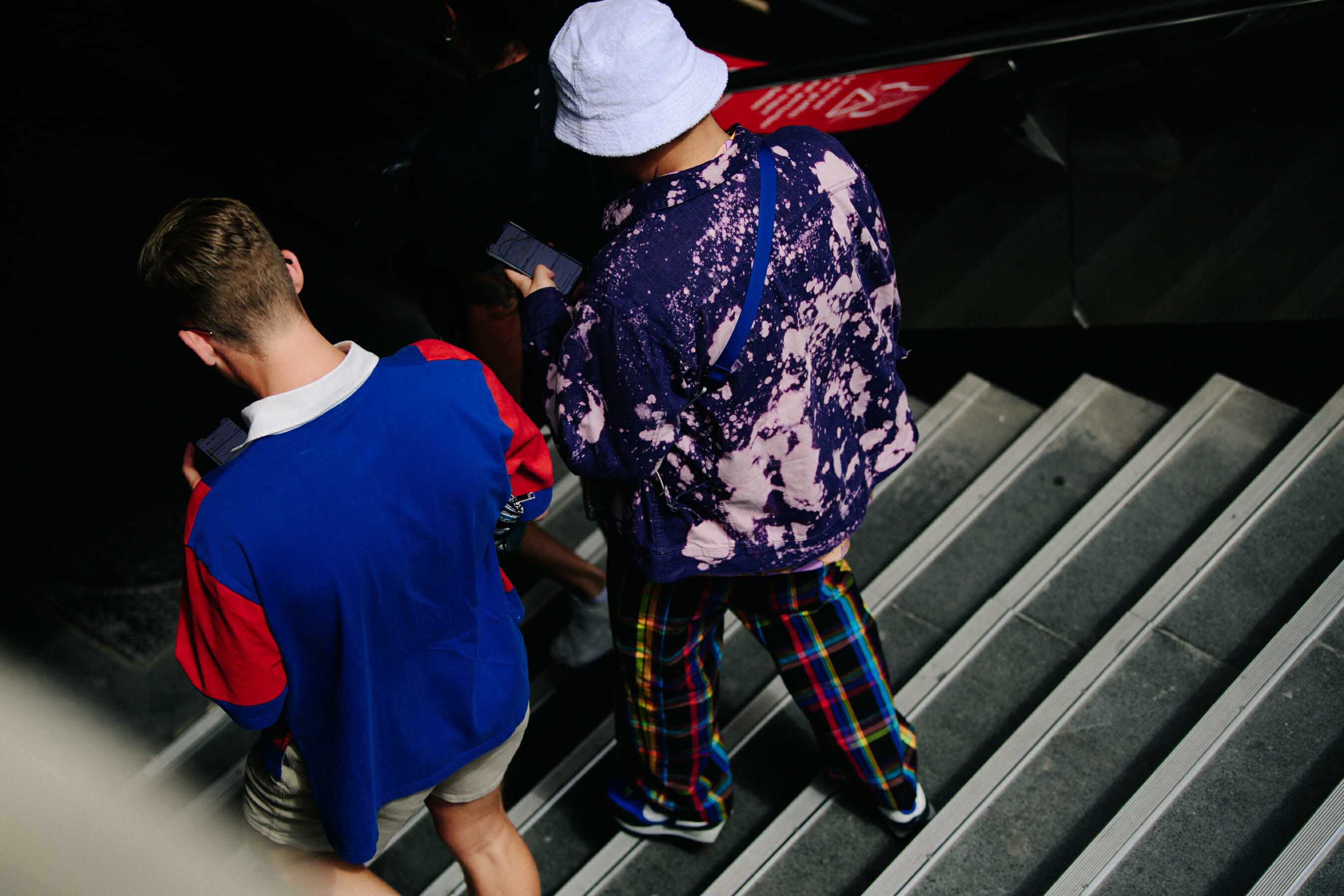 Two men wearing pattern outfits