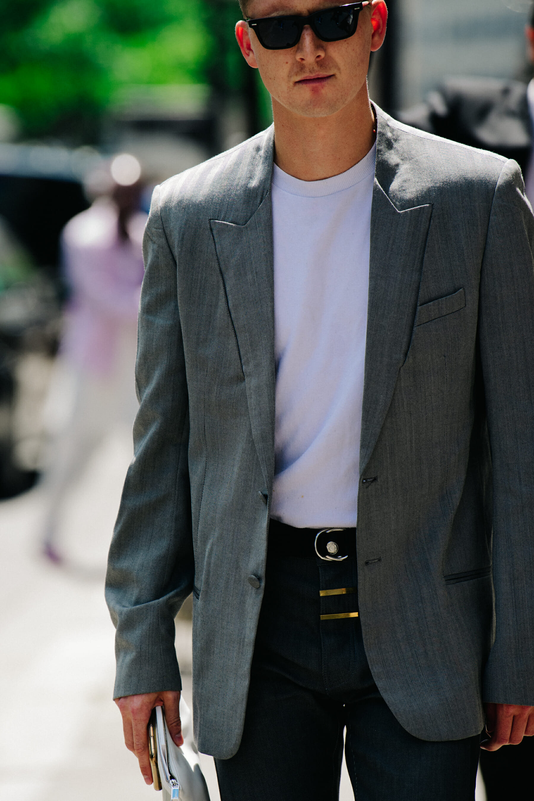 Man wearing grey suit jacket