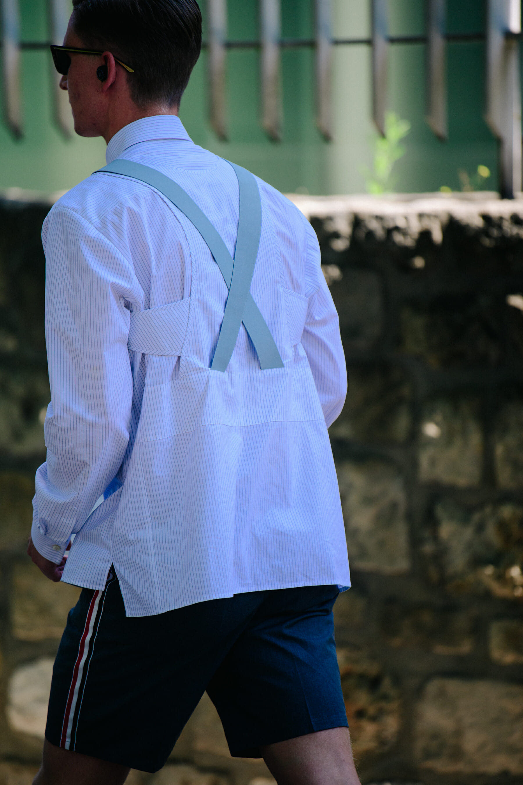 Man wearing striped white shirt