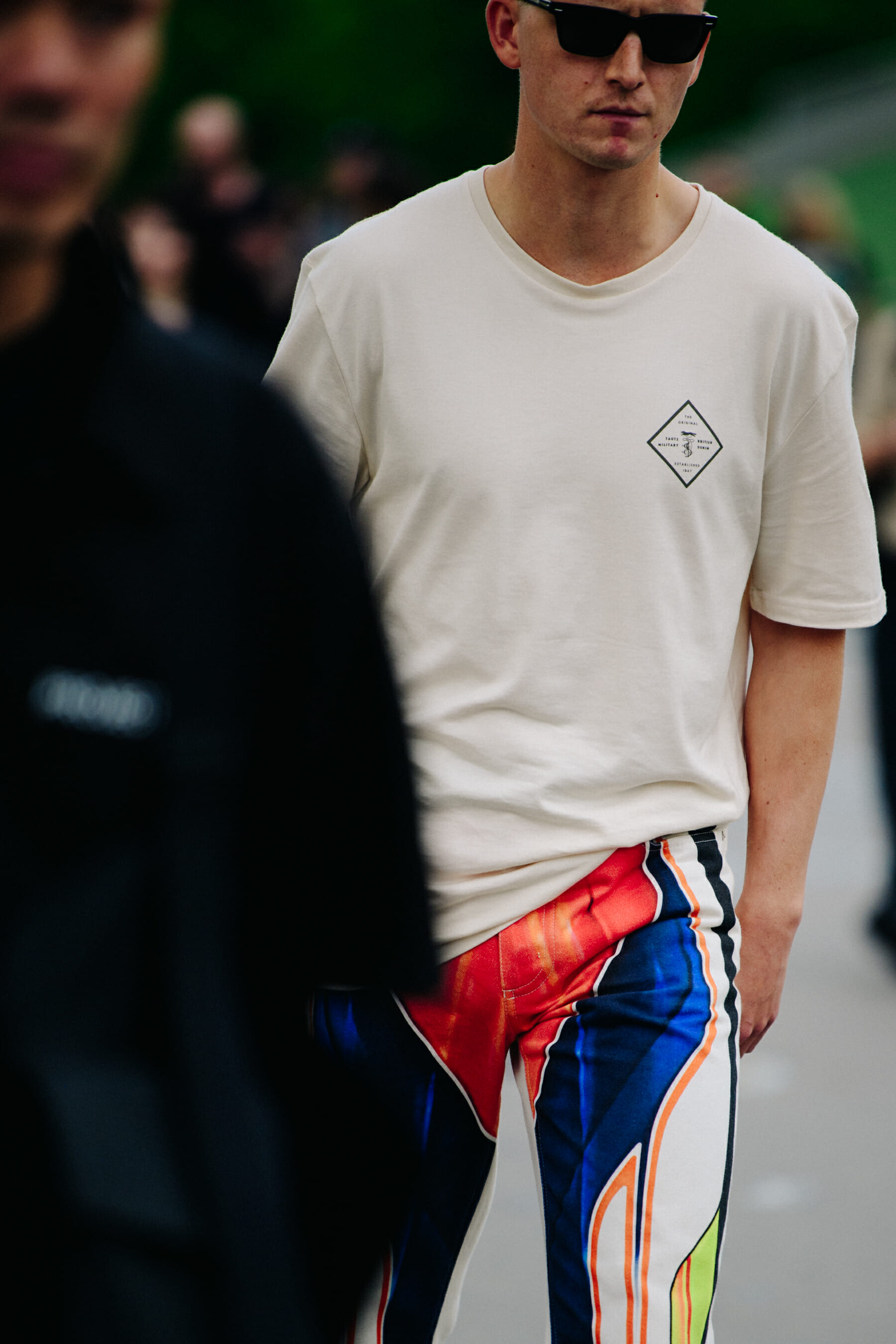 Man wearing colourful pants