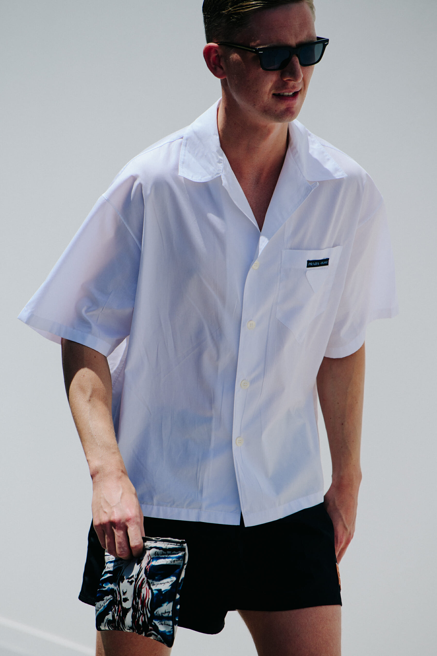 Man wearing Prada outfit
