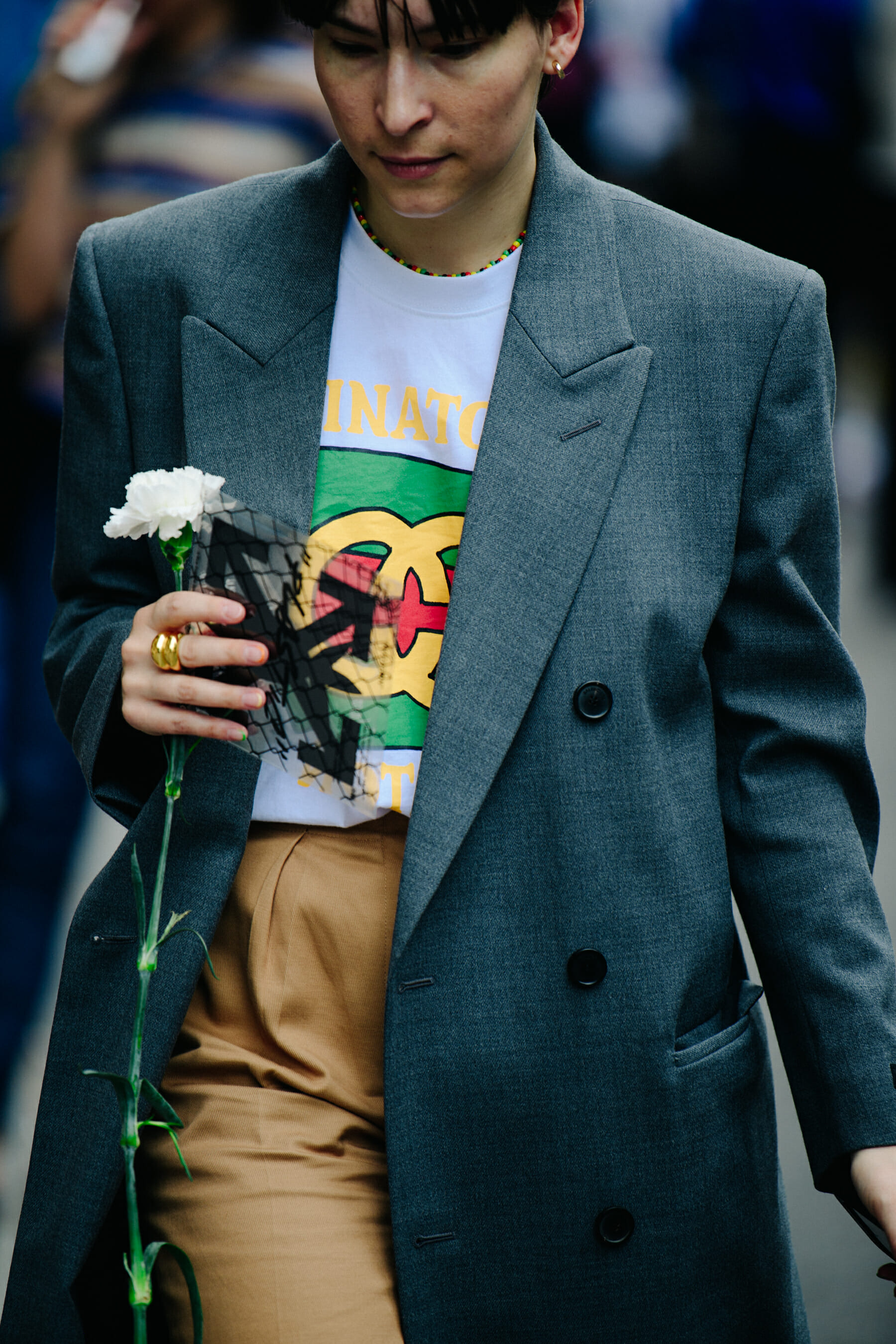 Woman wearing grey suit jacket