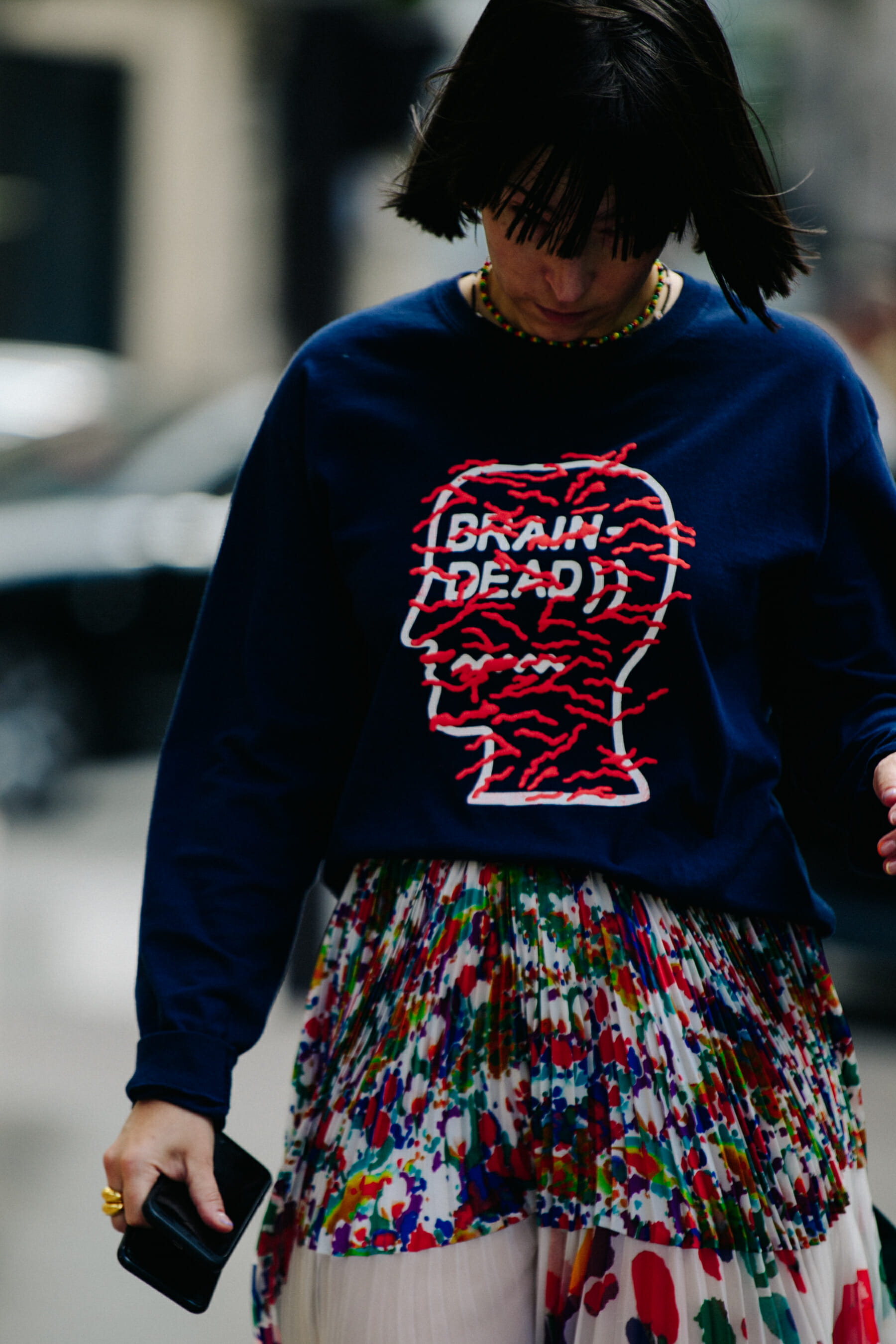 Woman wearing Brain Dead tee shirt