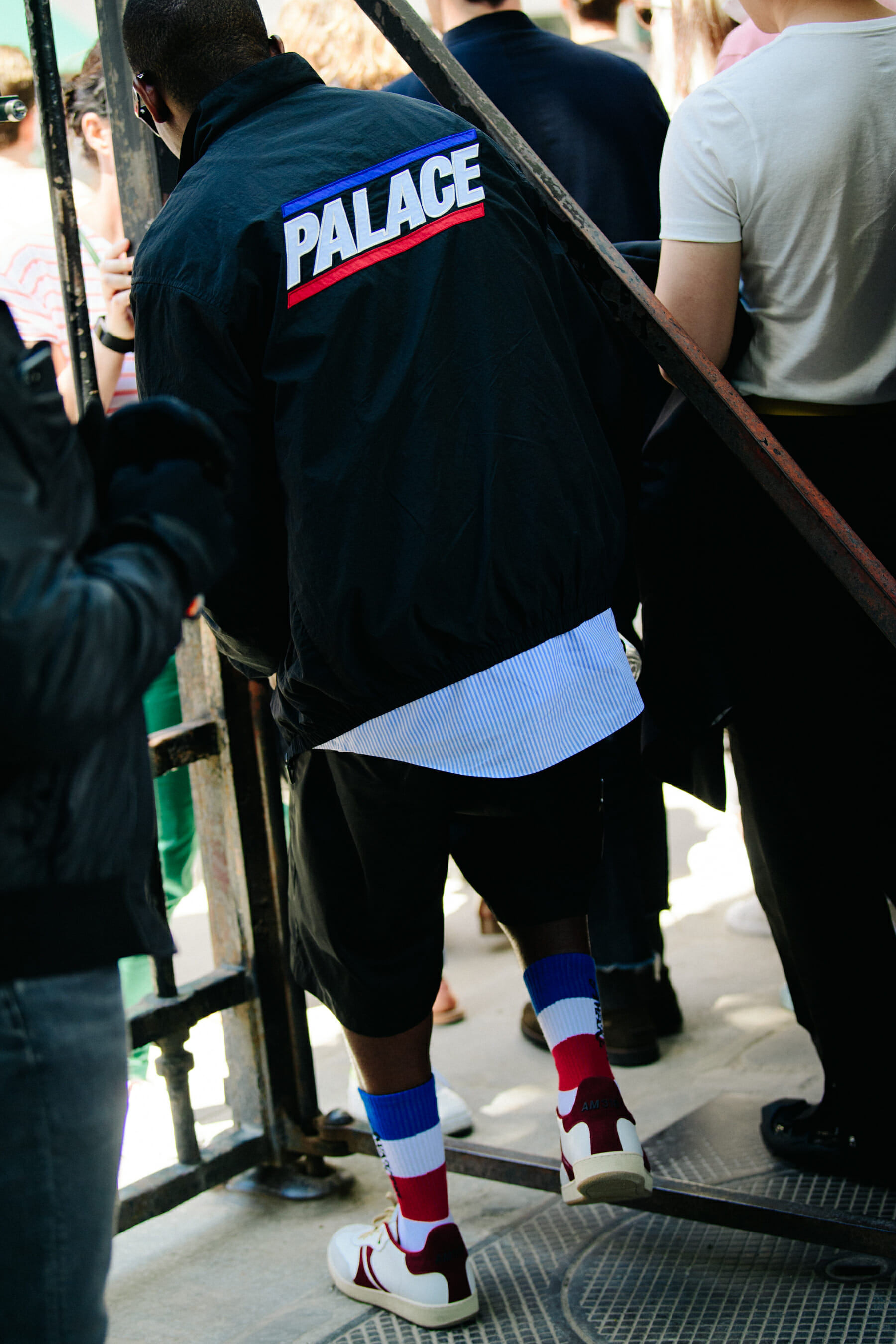 Man wearing Palace jacket