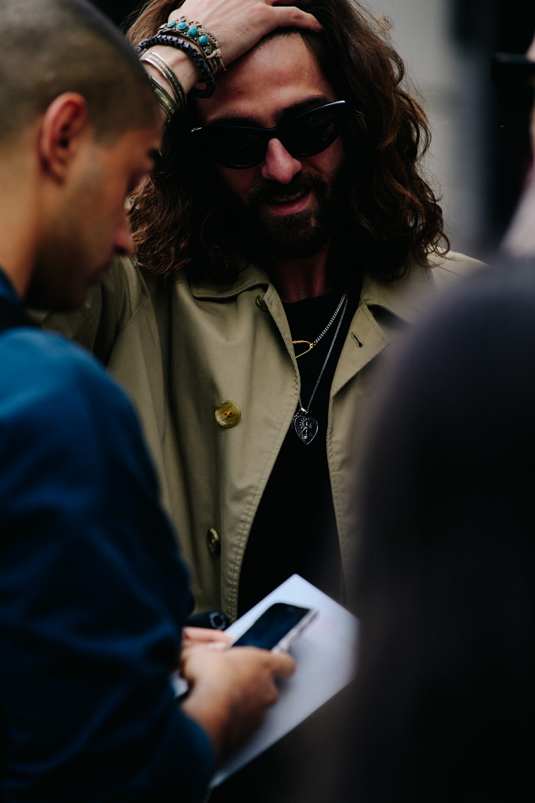 Man wearing tan coat