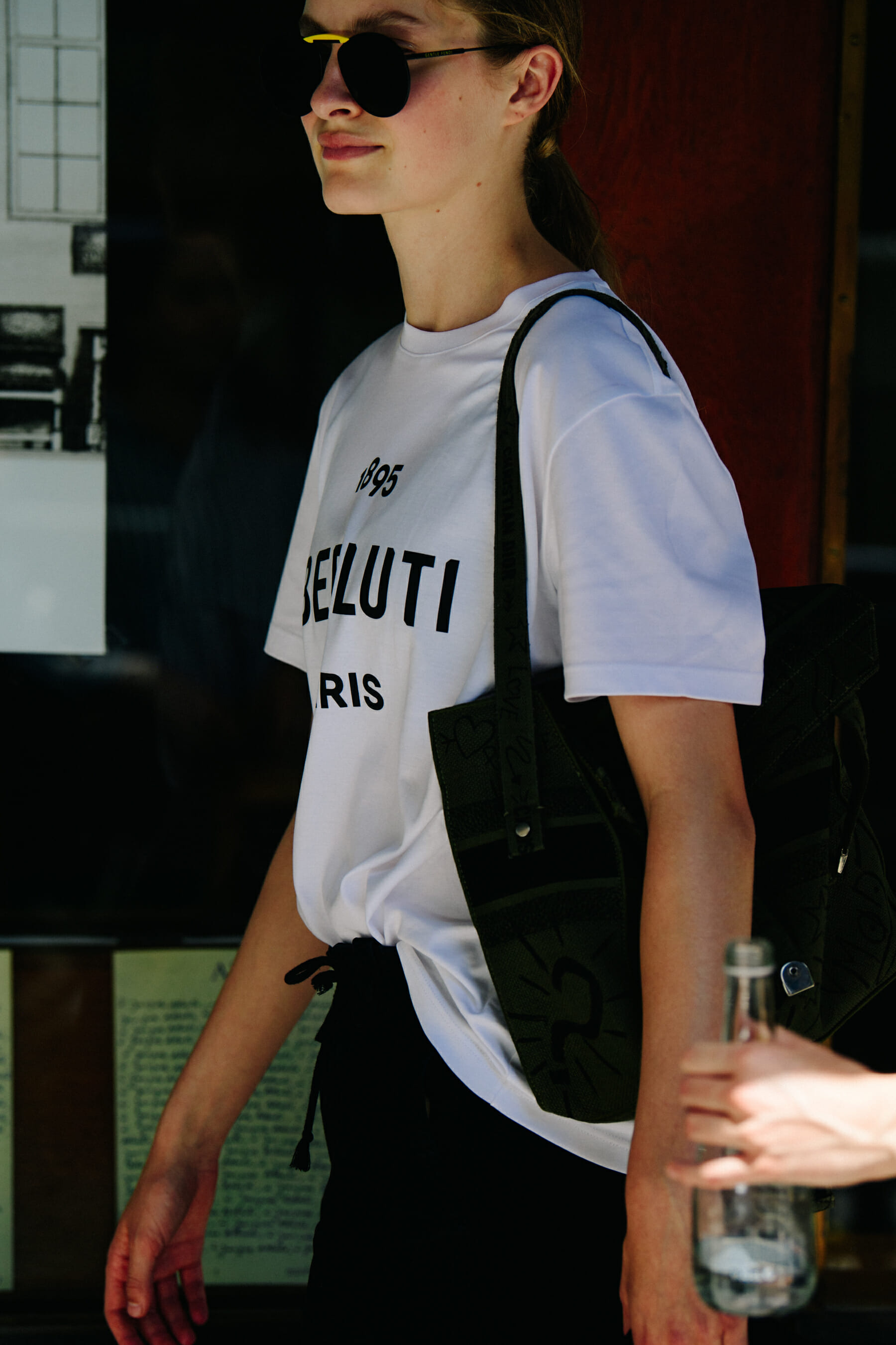 Woman wearing Berluti tee shirt