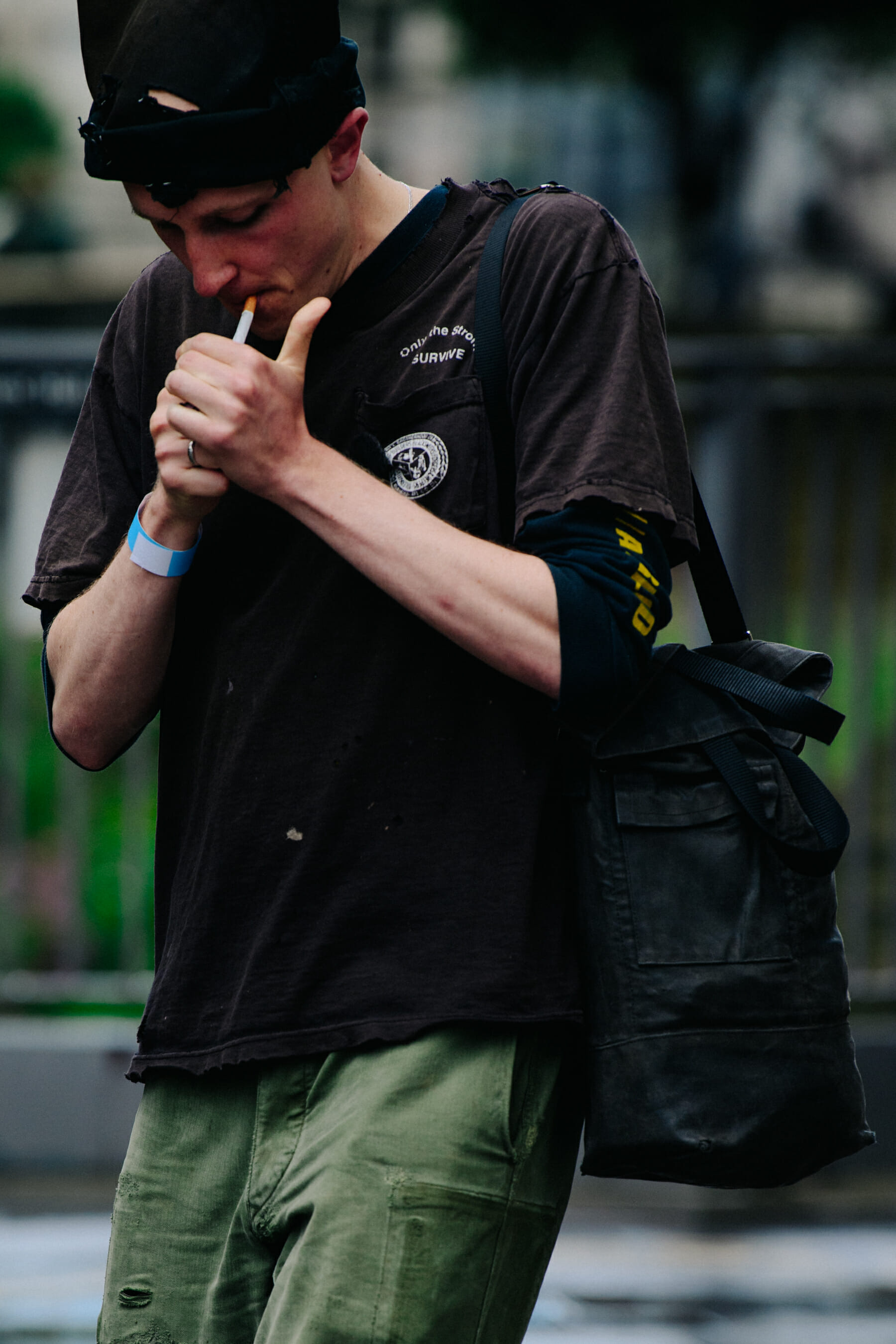 Man wearing brown tee shirt