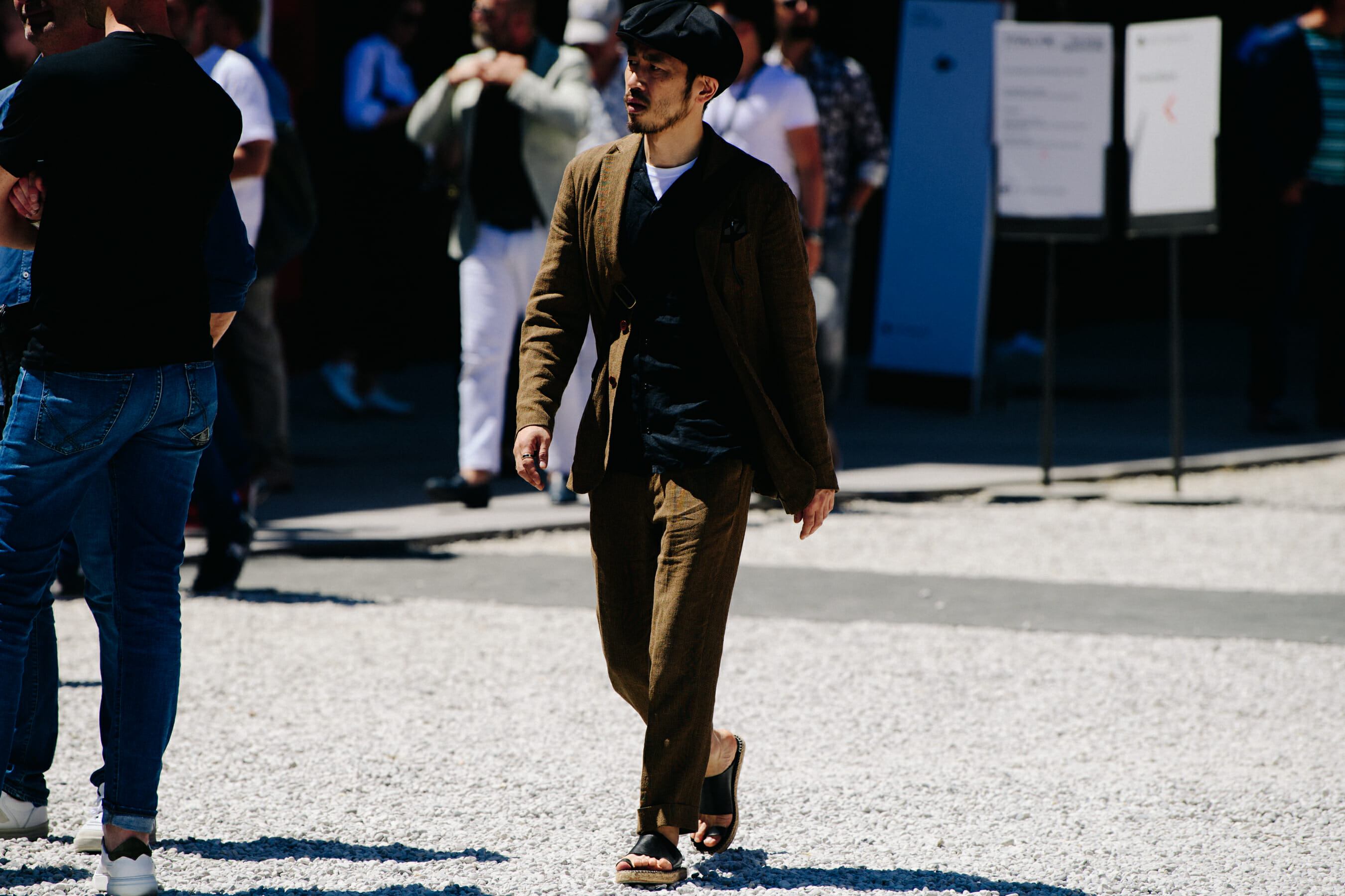 Man wearing brown suit