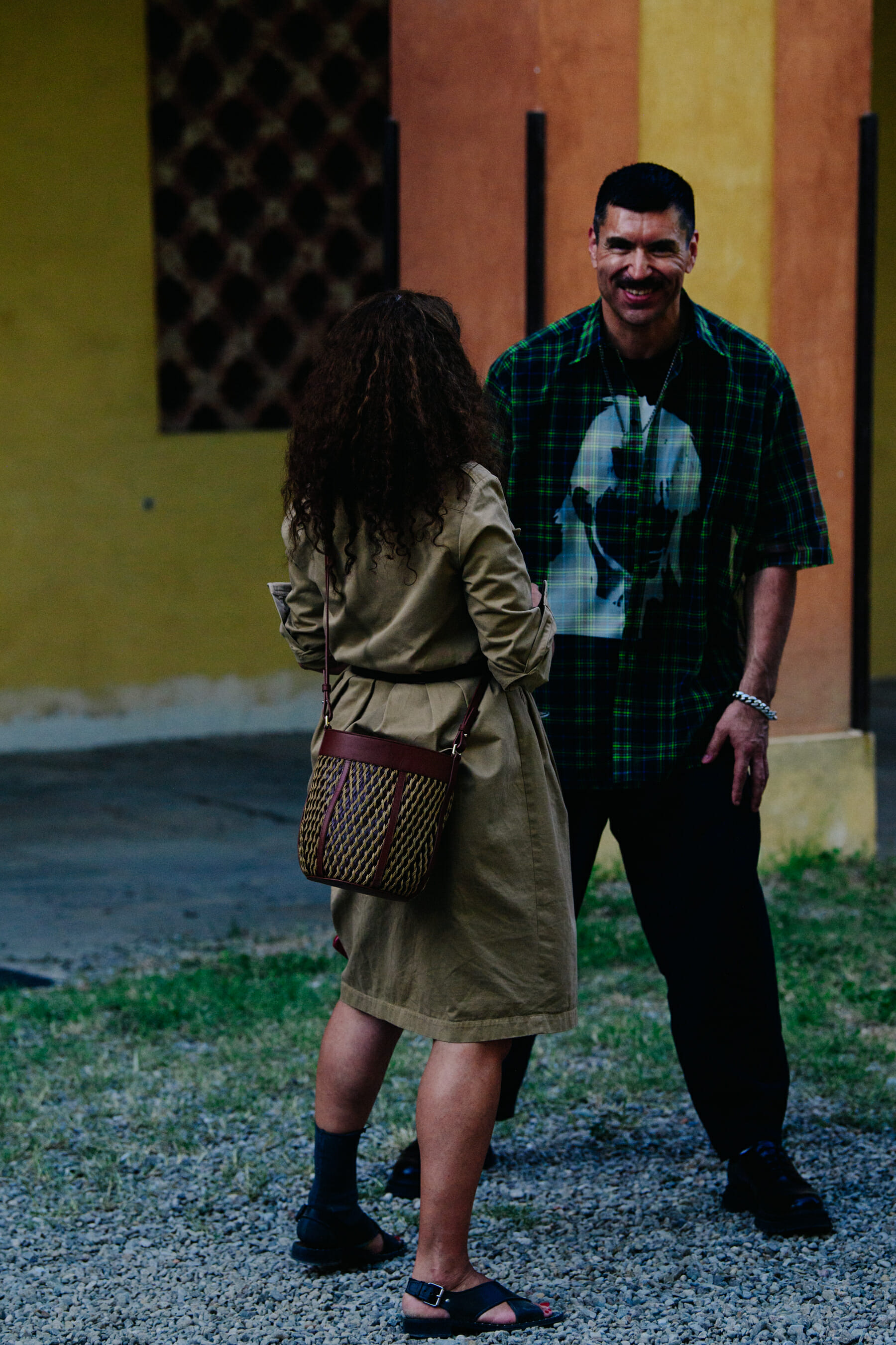 Couple wearing green outfits