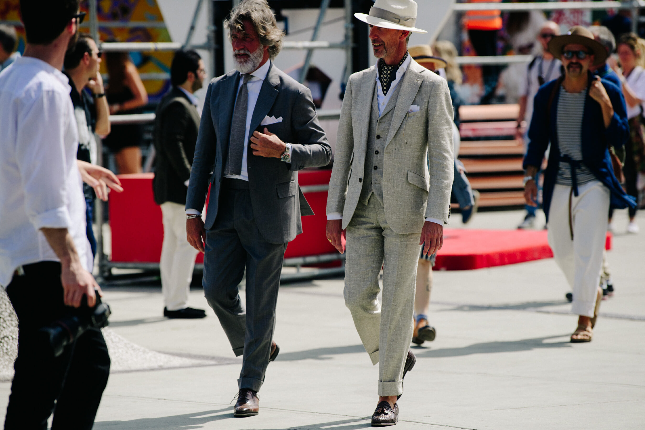 Two men wearing suits