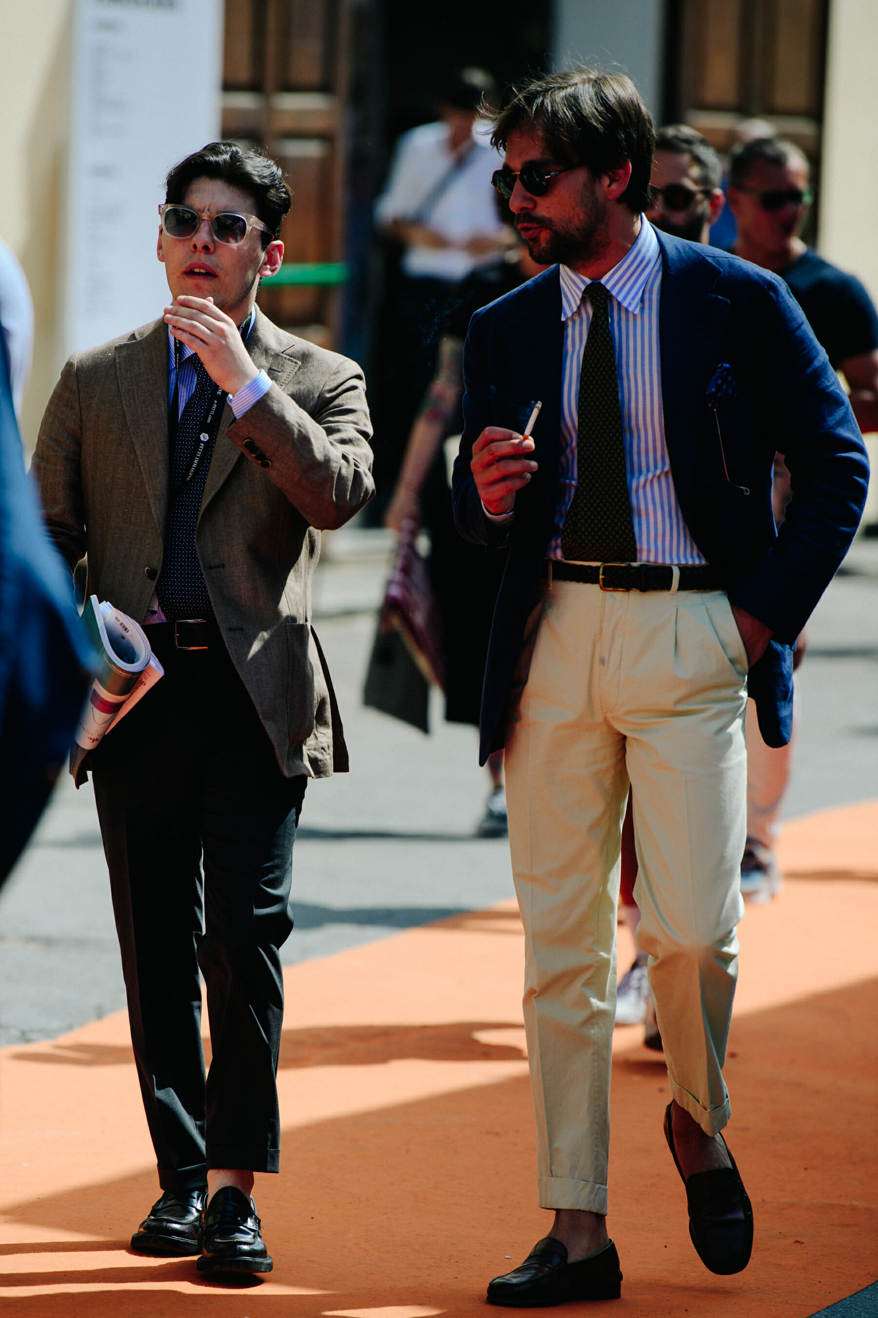 Two men wearing suits