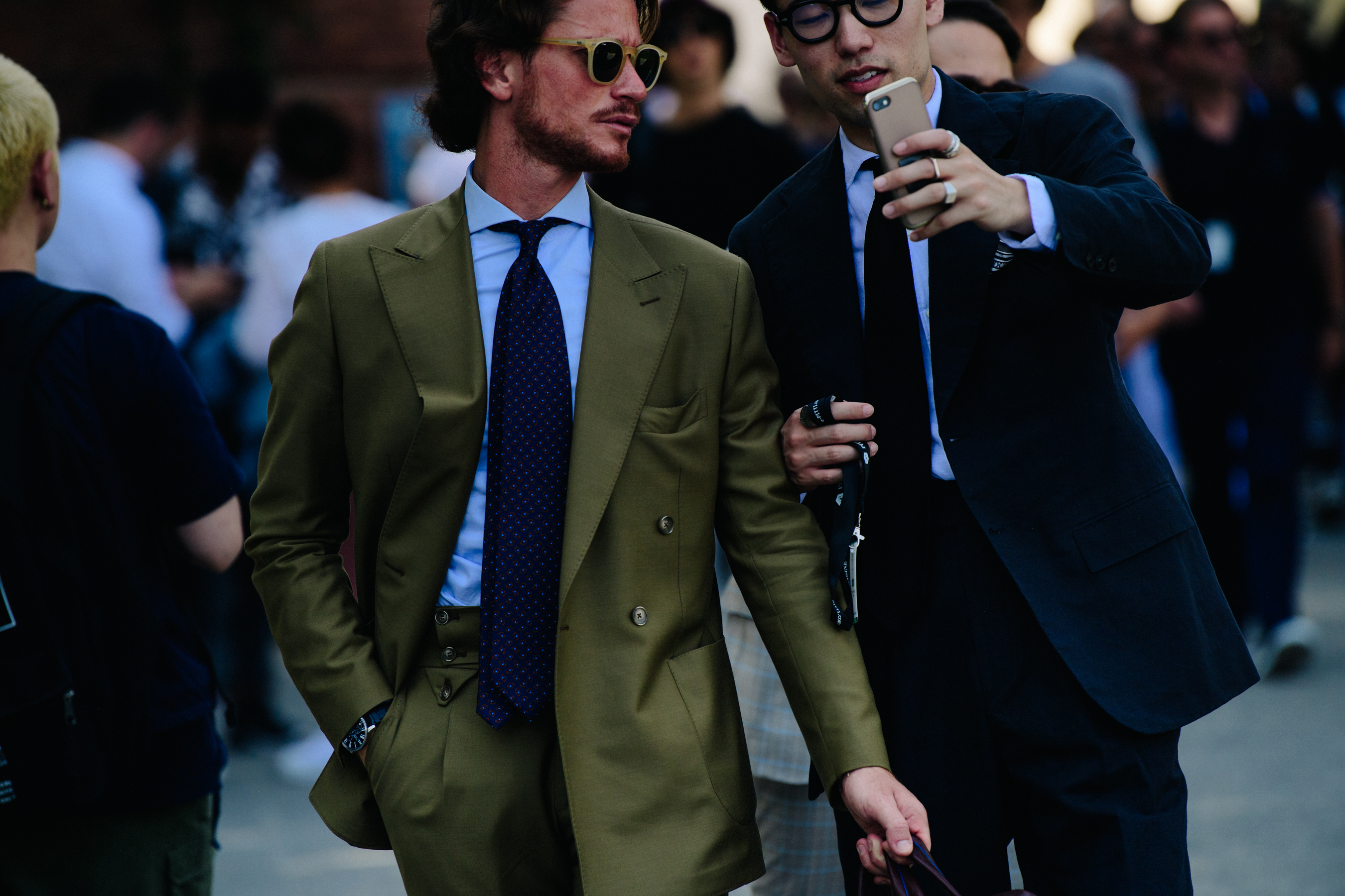 Two men wearing suits