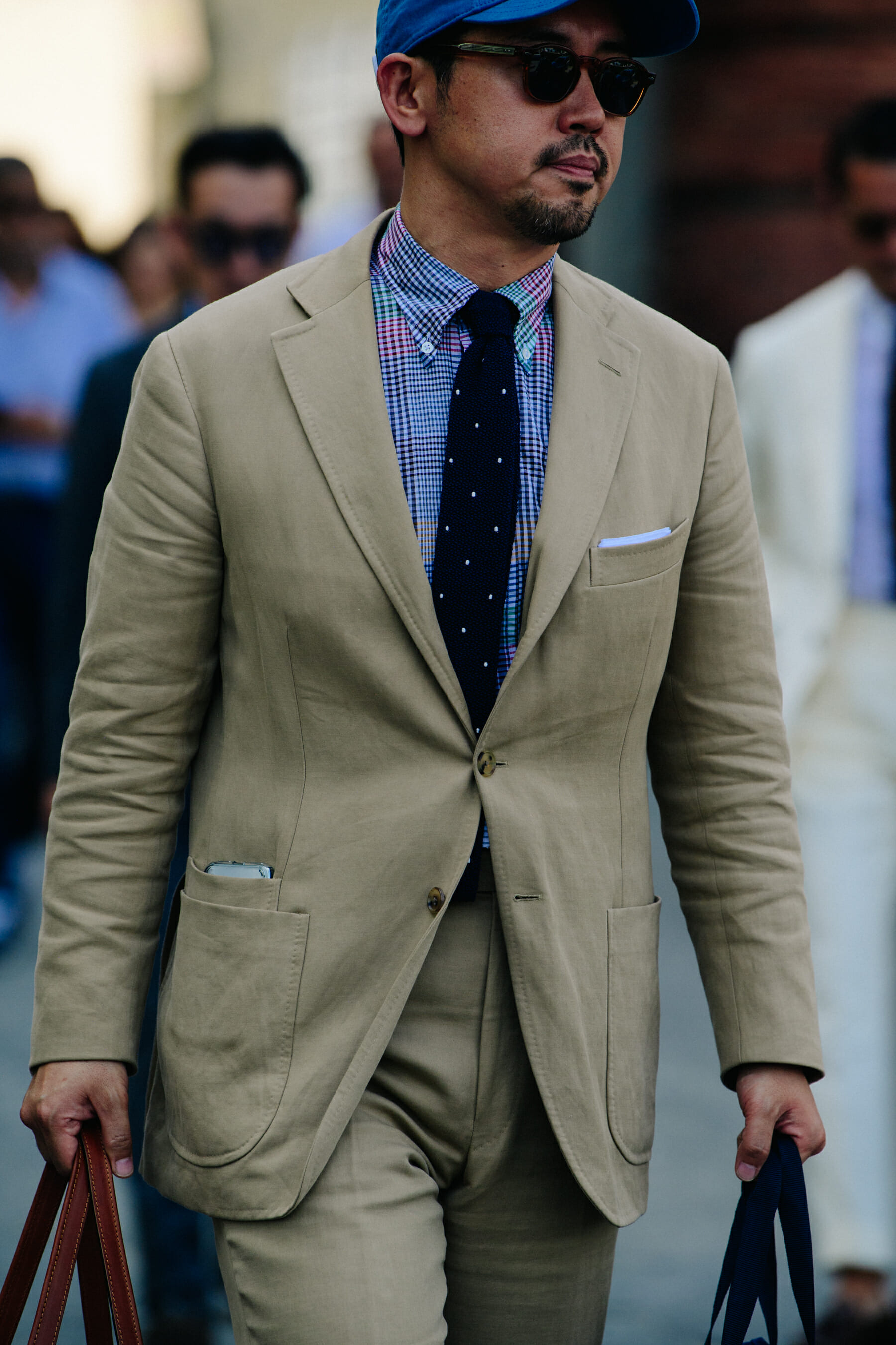 Man wearing blue baseball cap