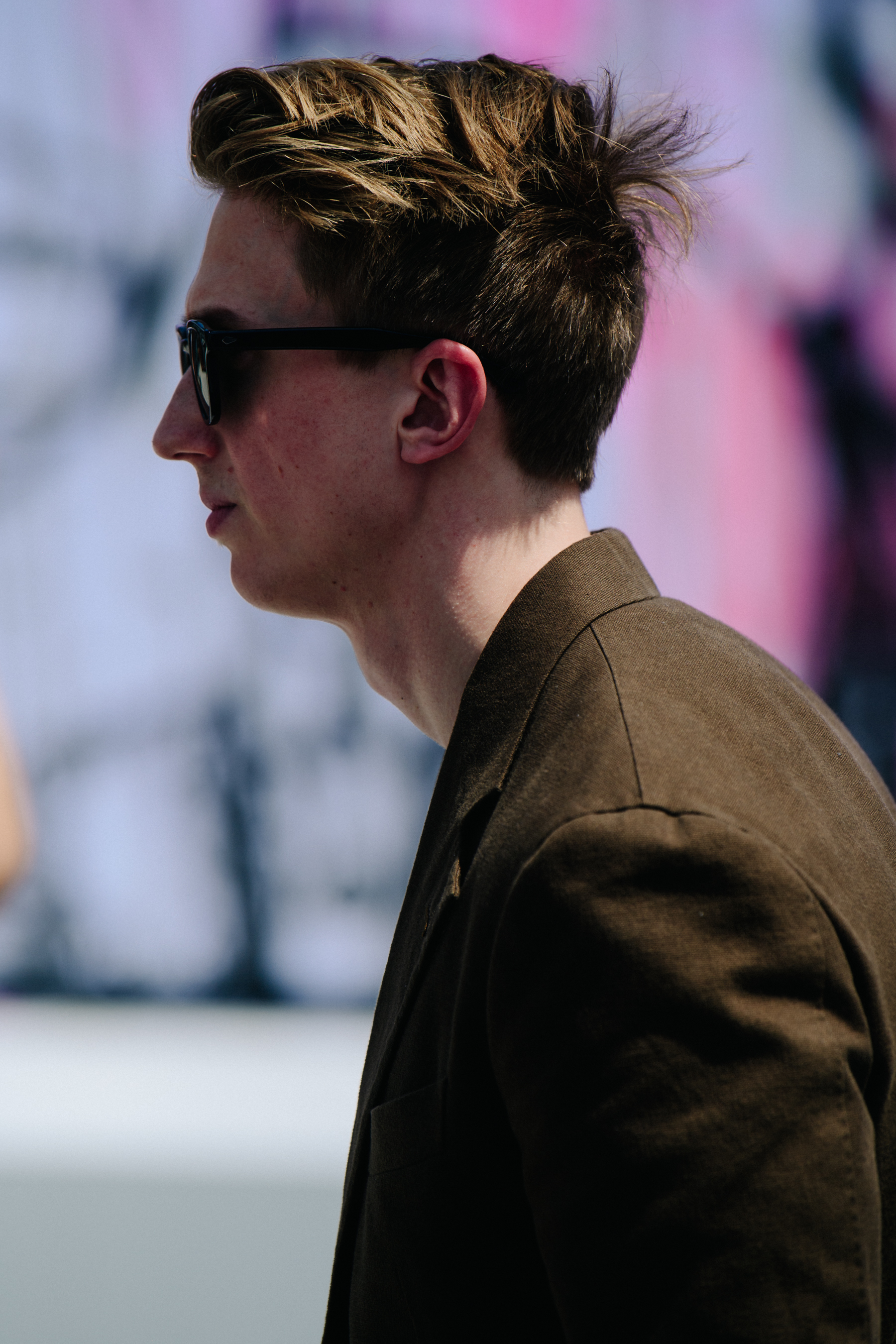 Man wearing brown jacket