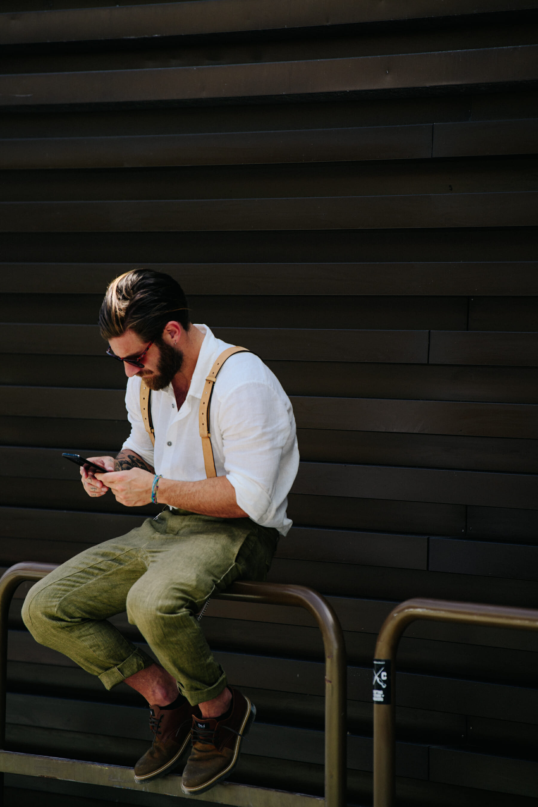 Man wearing leather braces