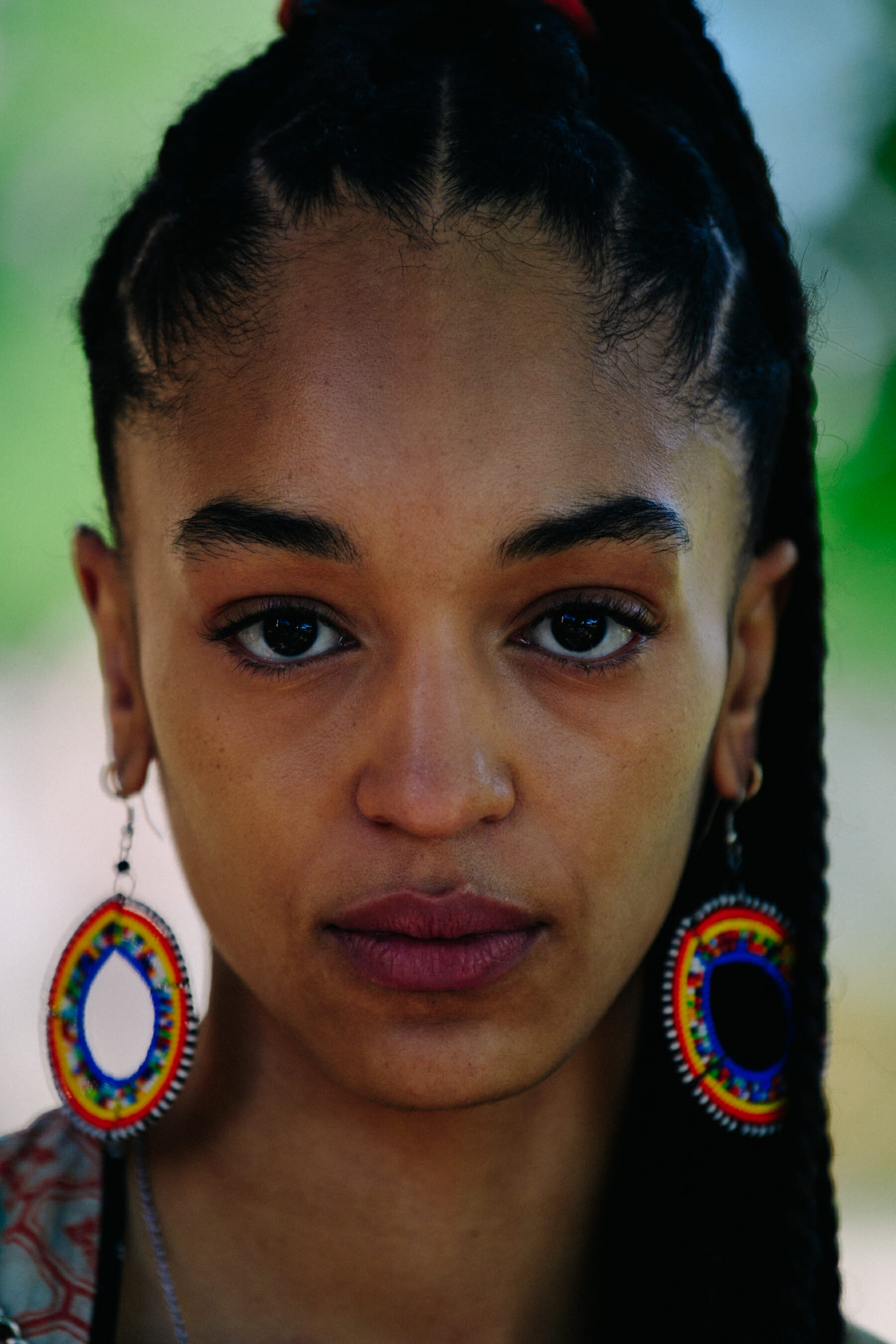 Portrait of model with colourful earrings