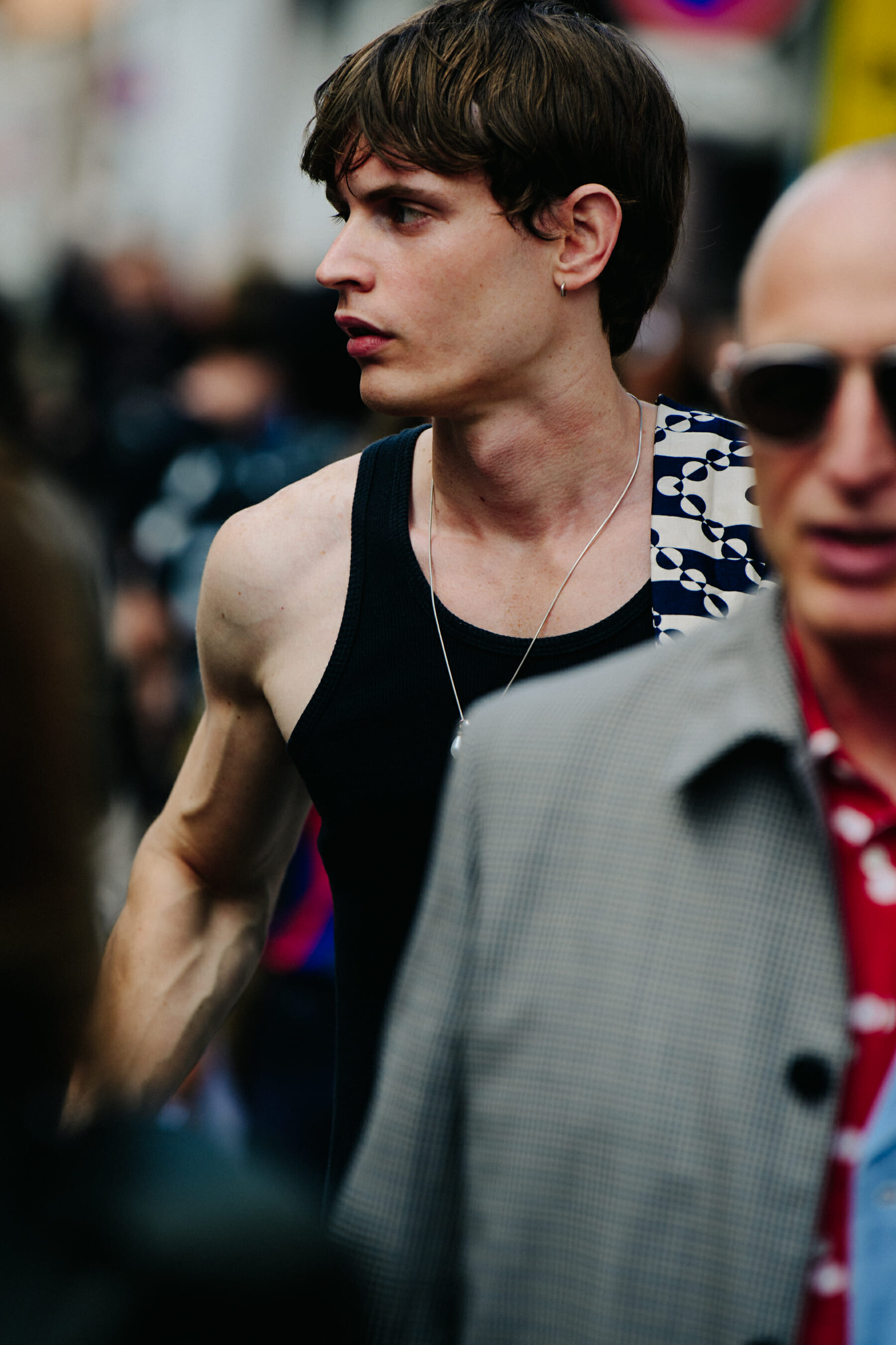 Model wearing black vest