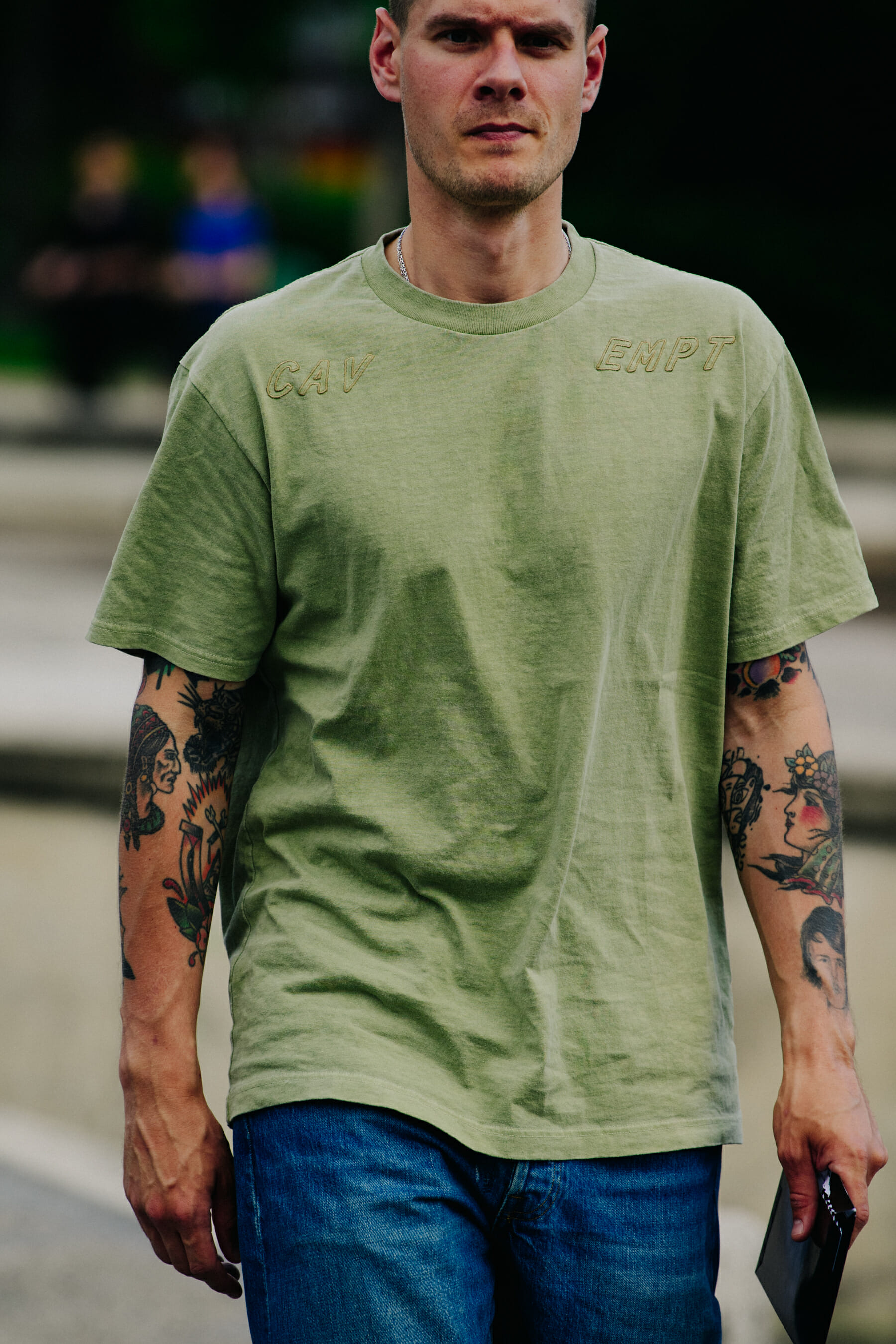 Man wearing green tee shirt
