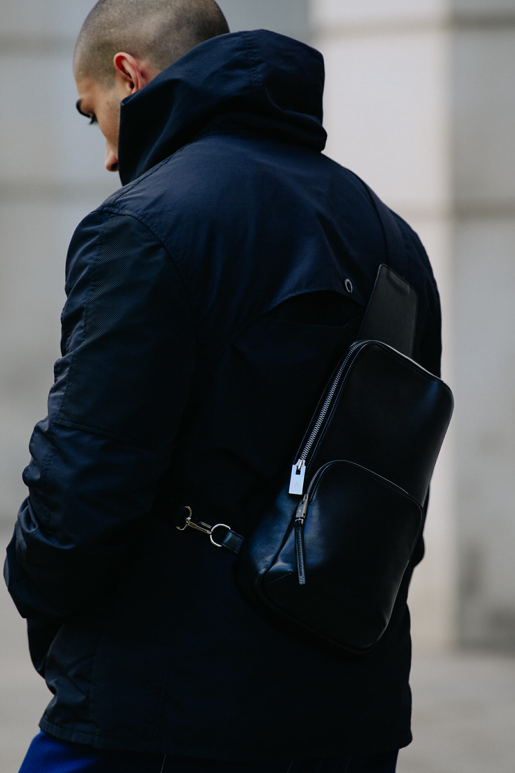 Man wearing Alyx bag