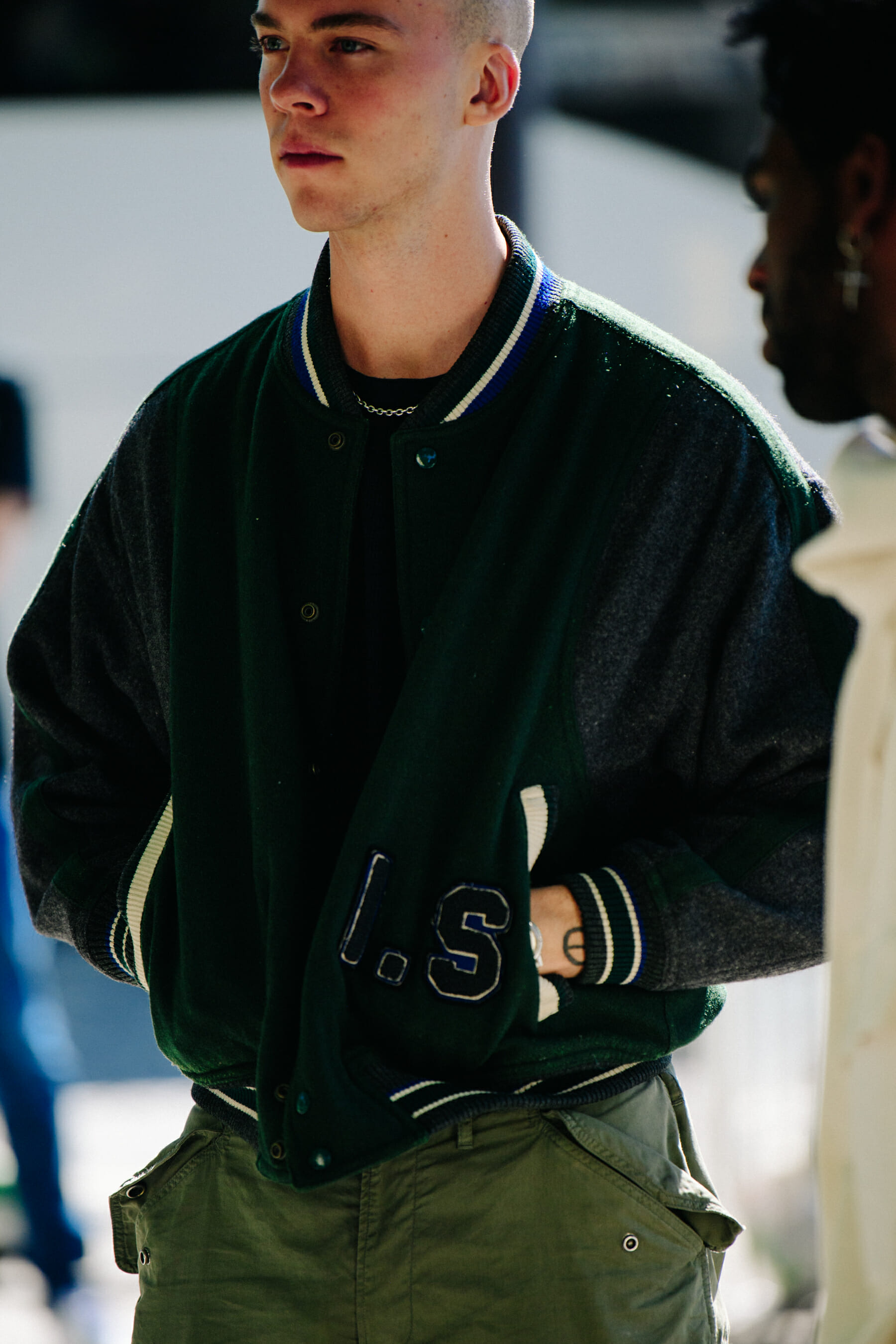Man wearing green jacket'