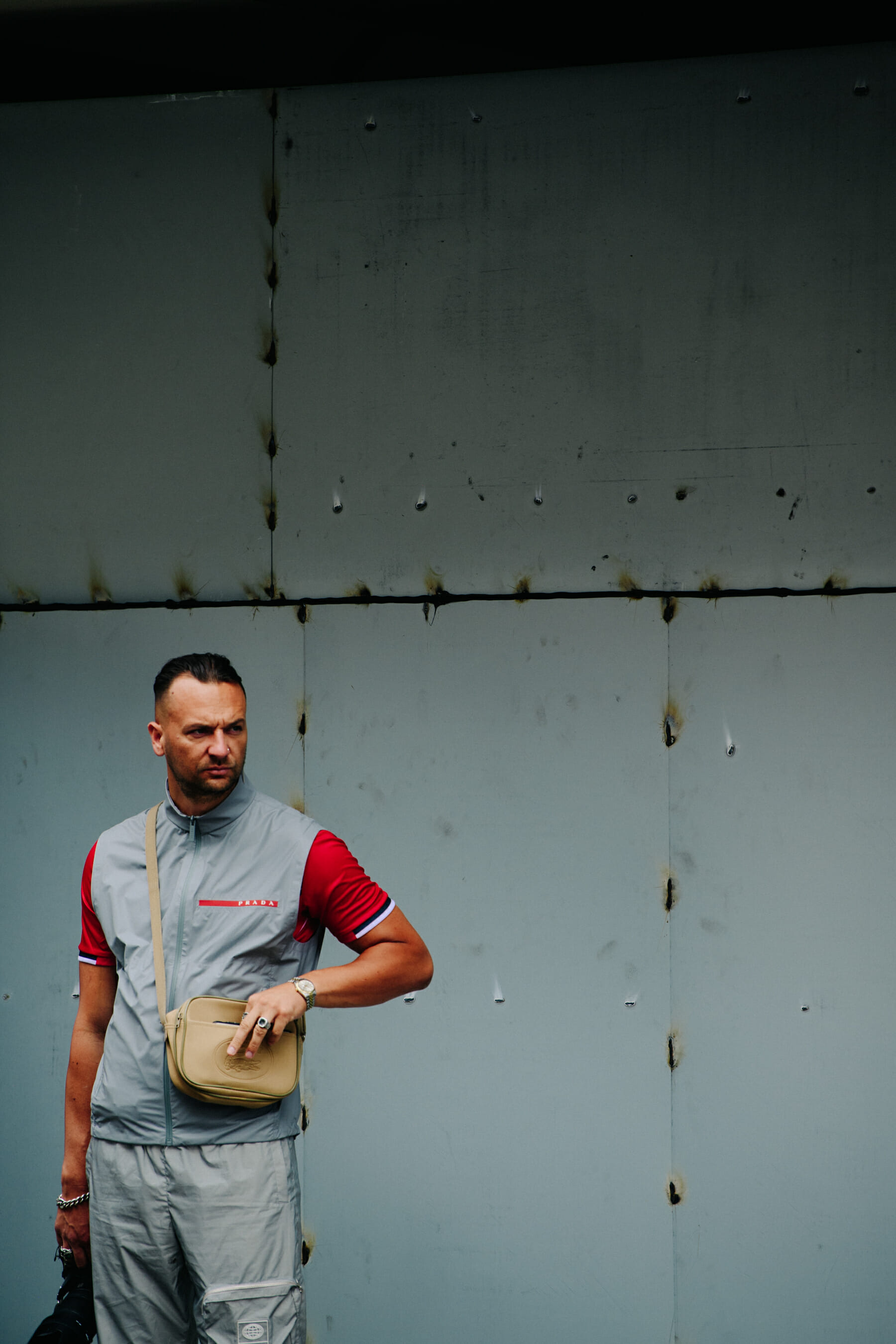Man wearing Prada vest