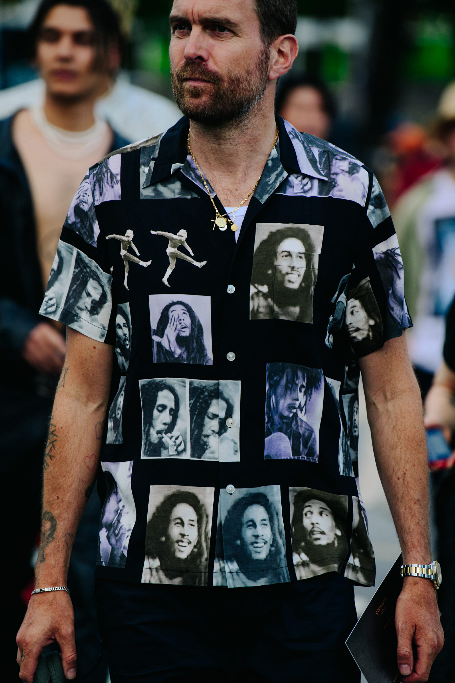 Man wearing black and white shirt