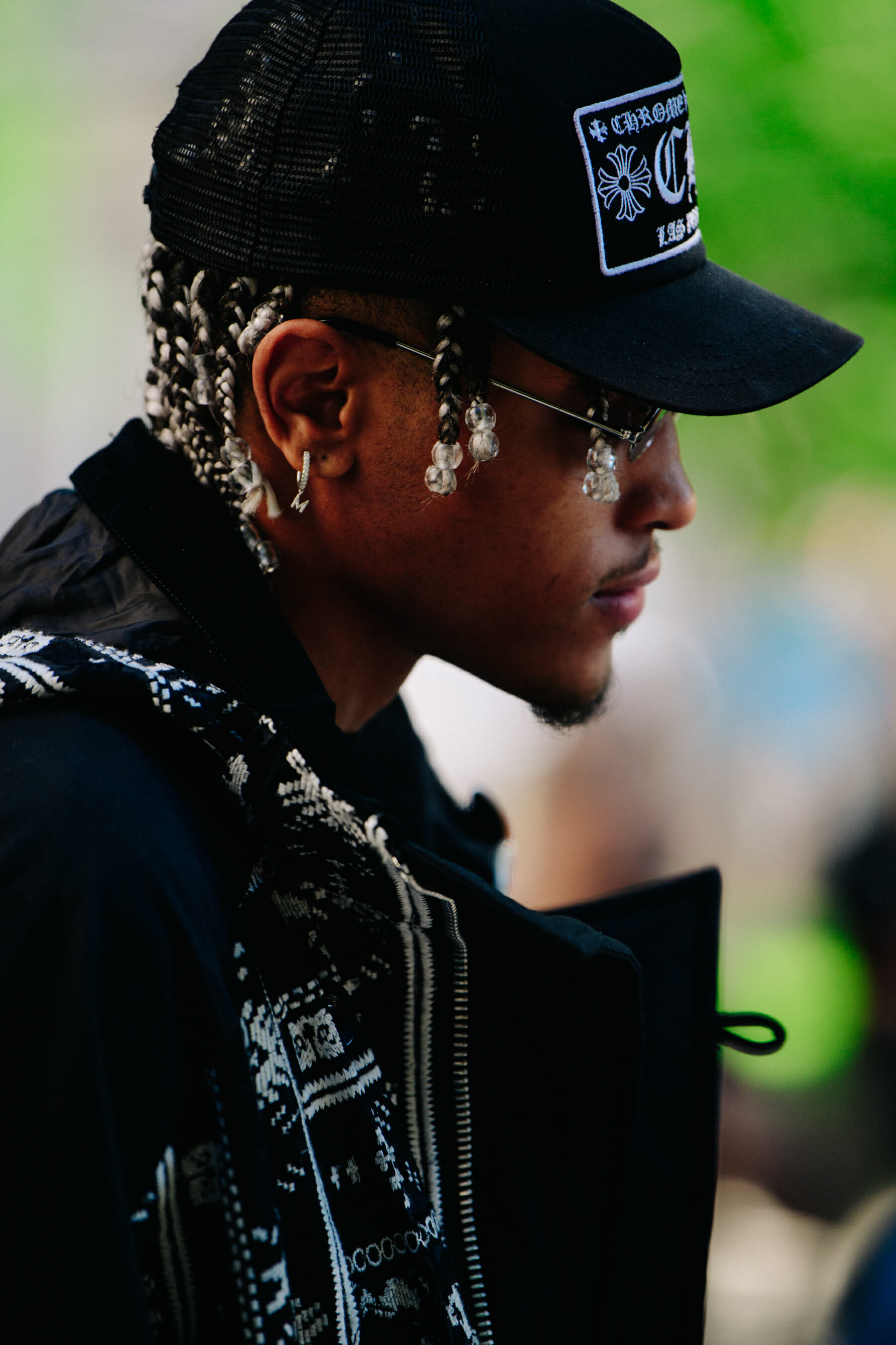 Man wearing black jacket and hat