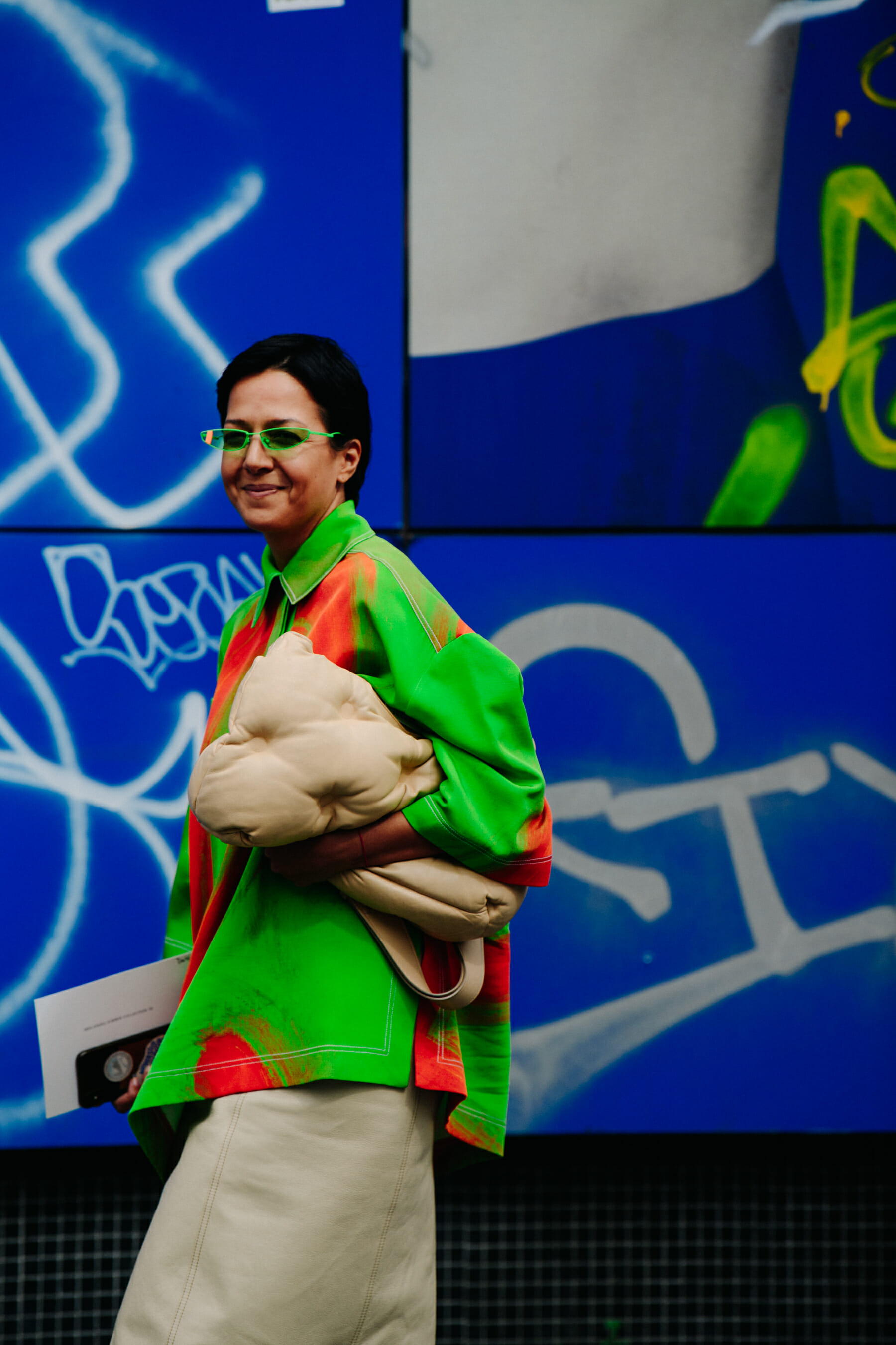 Woman wearing green sunglasses