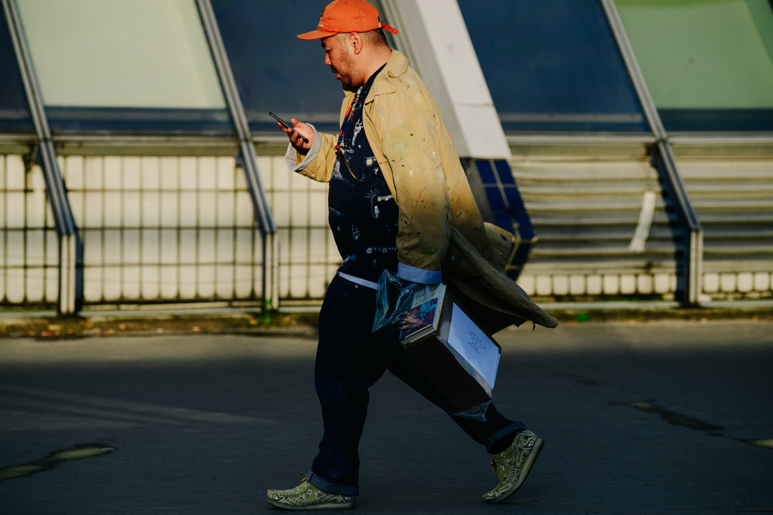 Man wearing orange cap