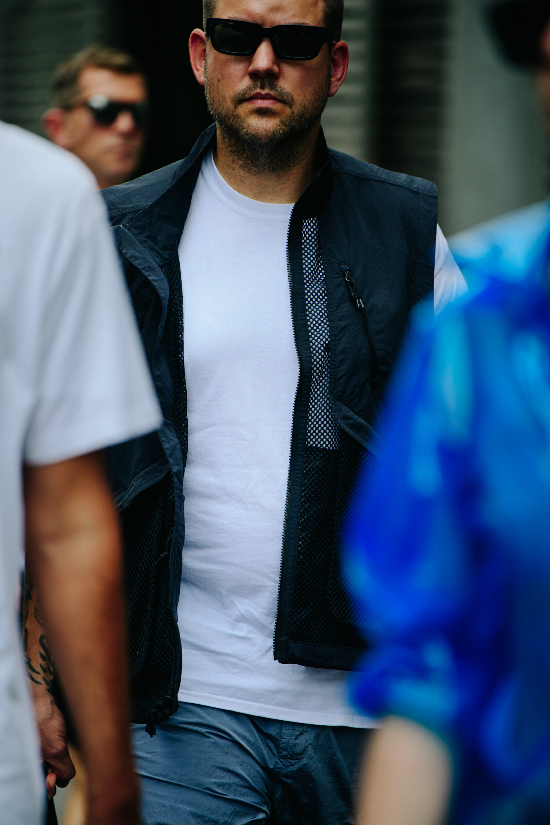 Man wearing black vest